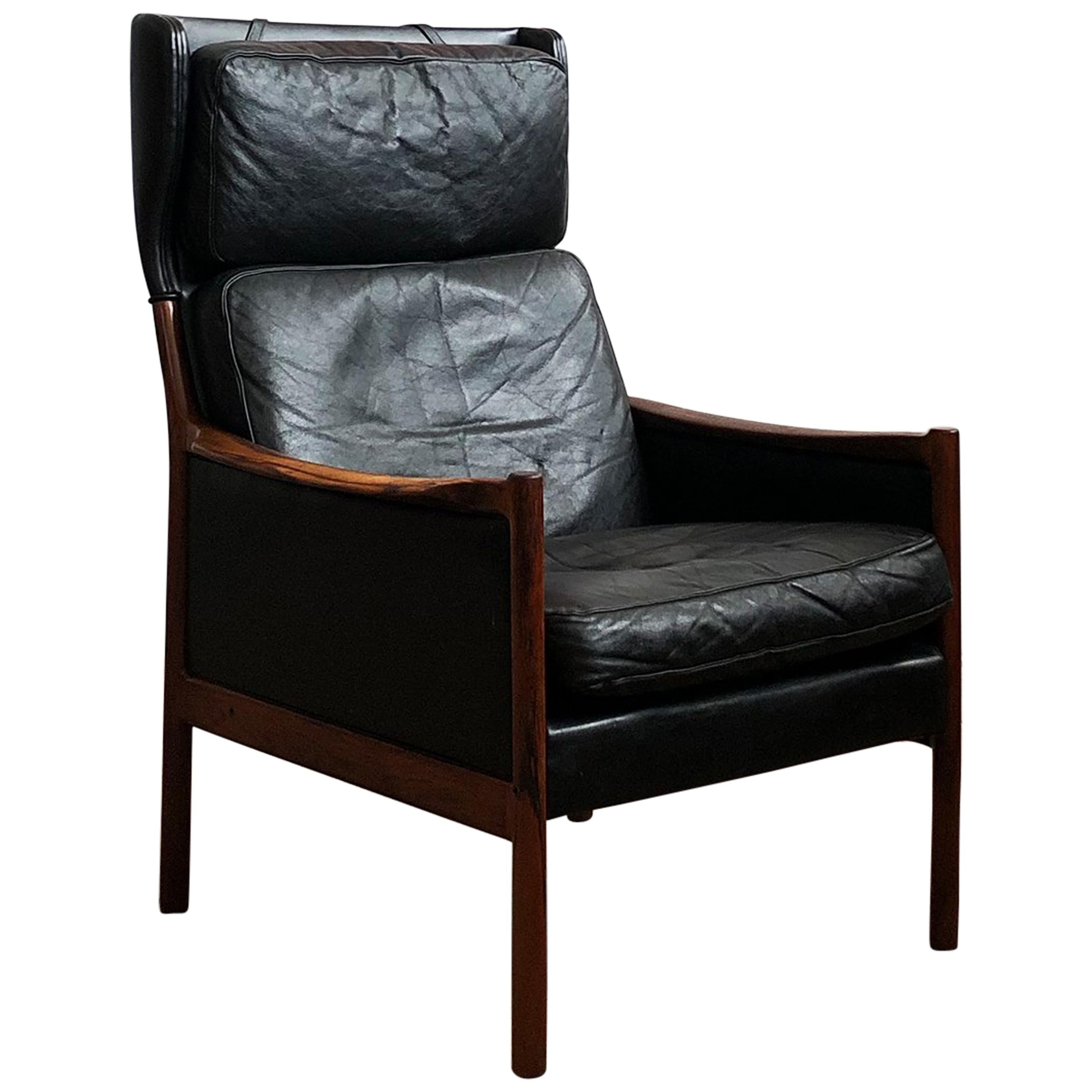 Danish Mid-Century Modern Rosewood and Black Leather Lounge Chair For Sale