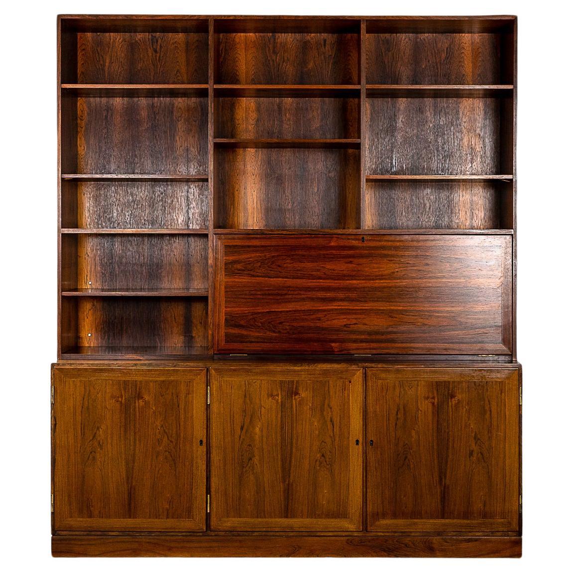 Bibliothèque/armoire danoise moderne en bois de rose du milieu du siècle dernier par Kai Winding
