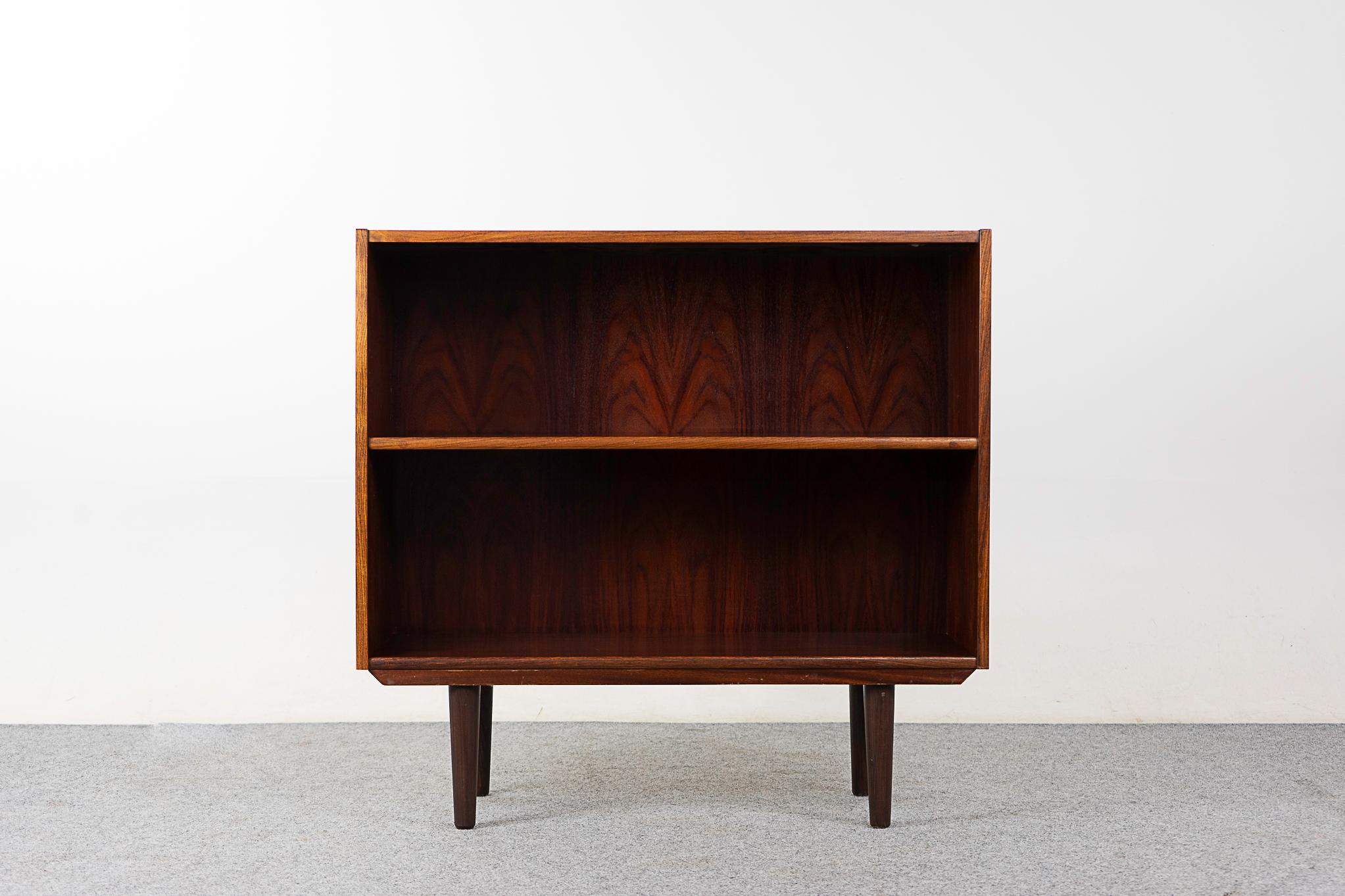 Rosewood mid-century bookcase, circa 1960's. Low profile open bookcase with adjustable shelf. Compact design/size, perfect for condo living! 