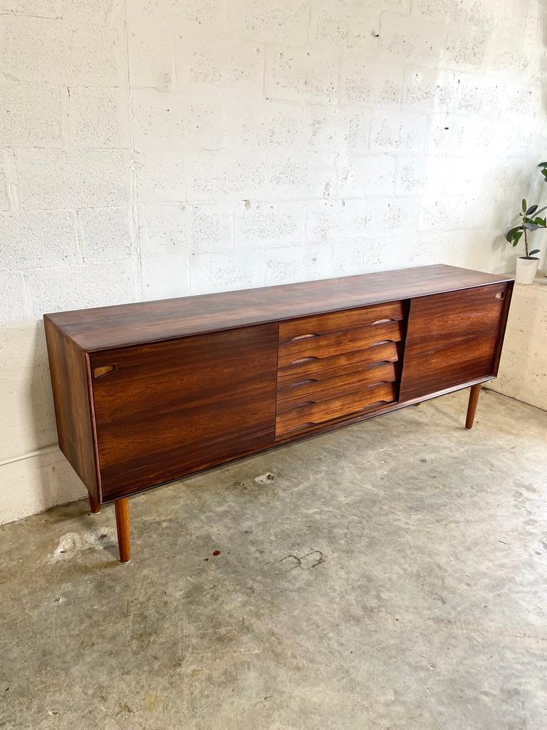 Stunning Long Danish Mid Century Modern Console or Credenza. Shelf behind doors. 5 drawers on middle. 86.75w 18.5d 34h