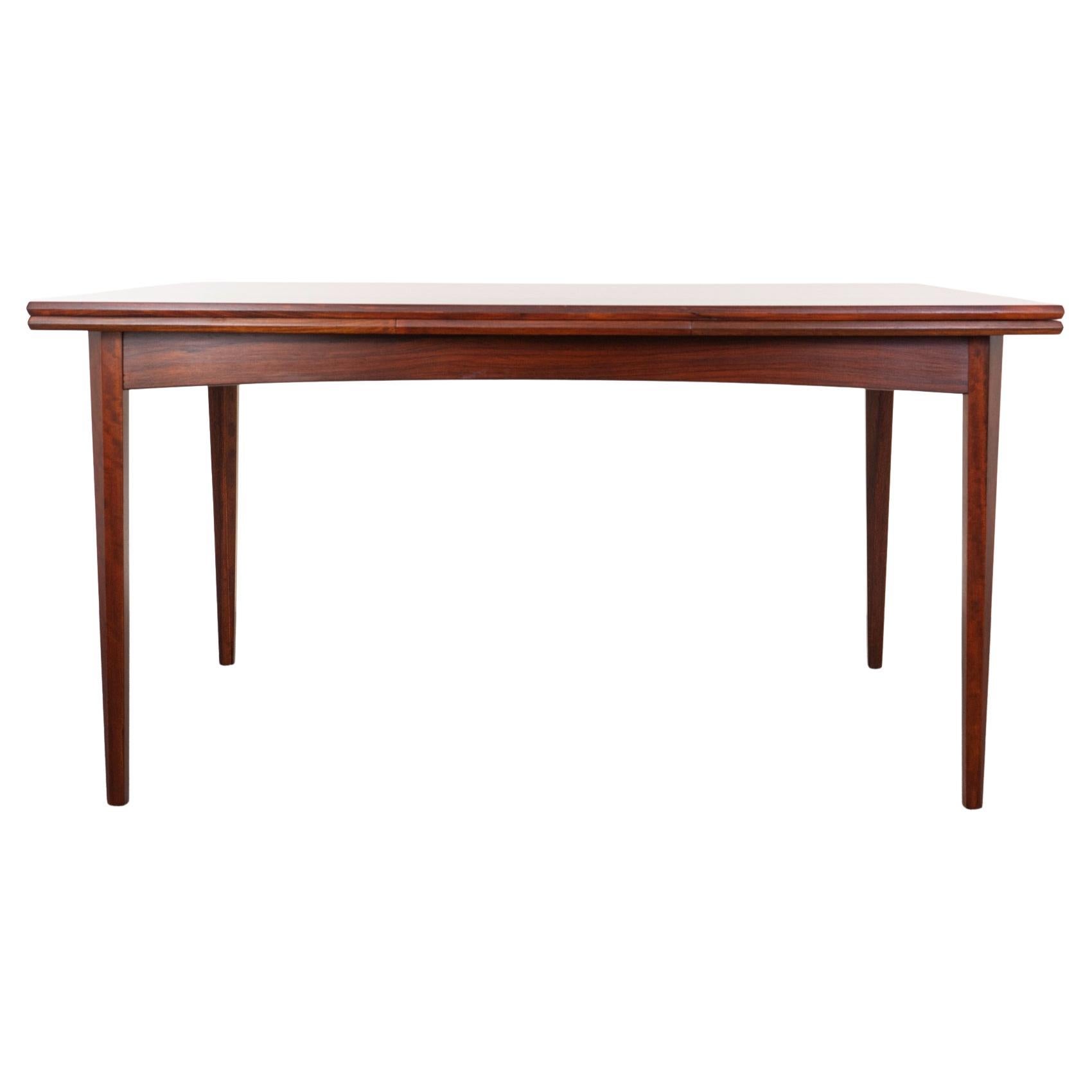 Mesa de comedor danesa de palisandro de mediados de siglo
