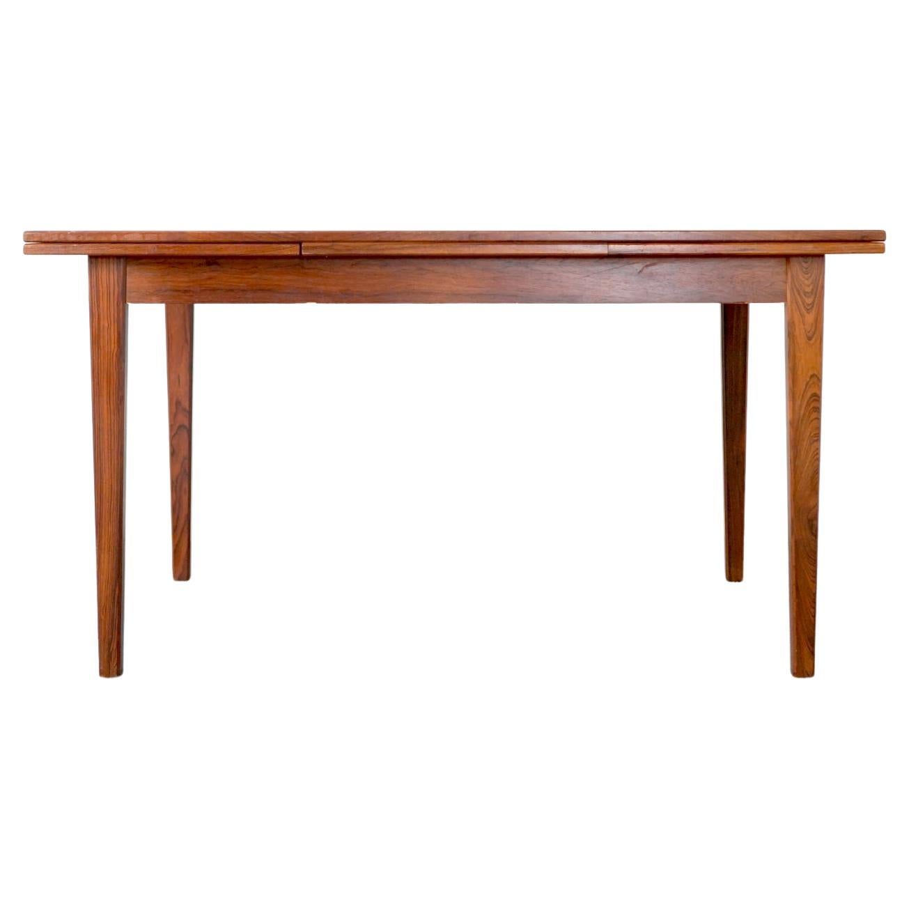 Danish Modern Rosewood Expandable Draw Leaf Dining Table at 1stDibs