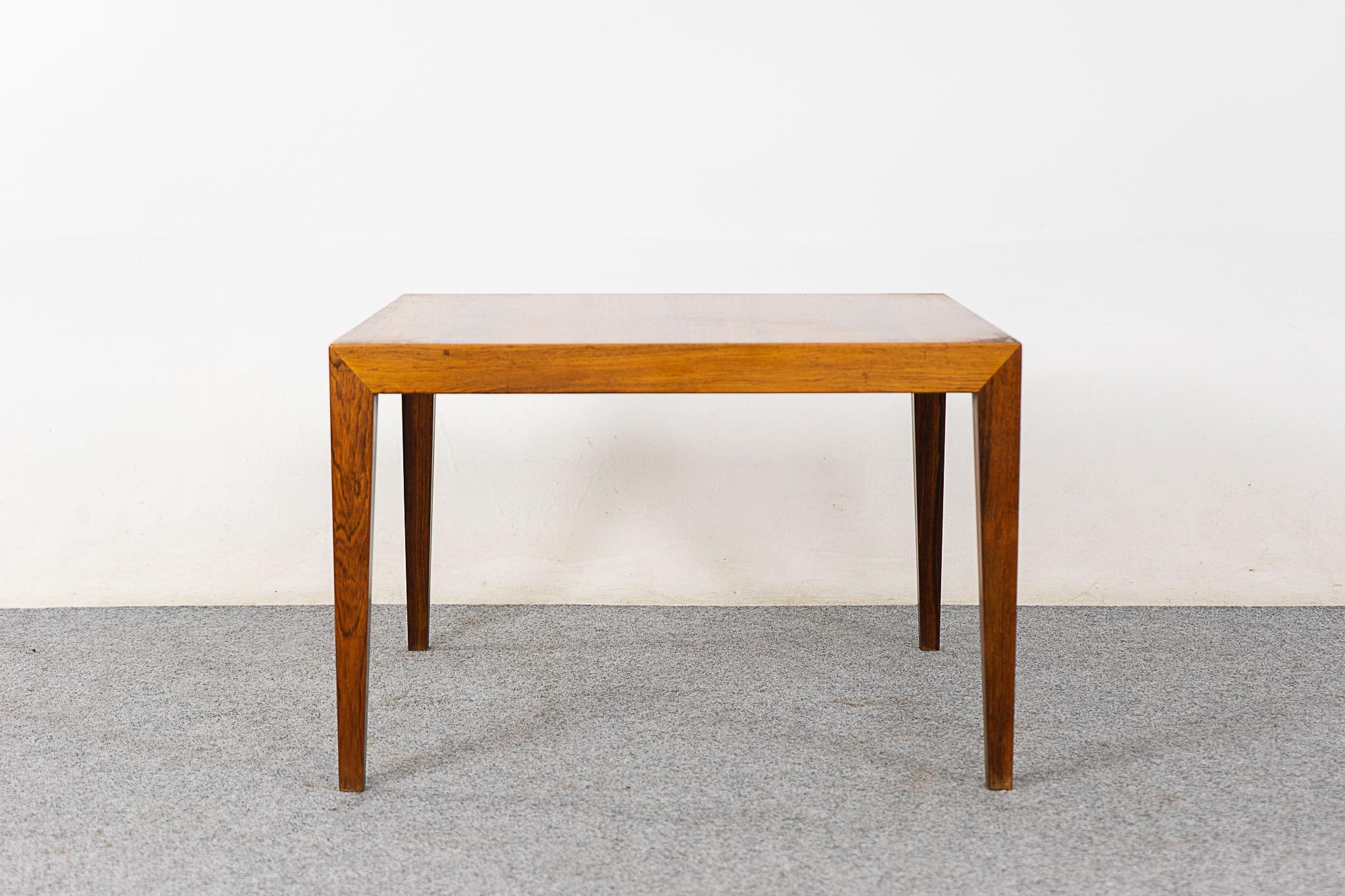 Rosewood mid-century side table by Haslev, circa 1960's. Compact, highly functional table with sleek corner joinery. Haslev's maker's mark and Danish Furniture Control stamp intact. 

Unrestored item, some marks consistent with age. 