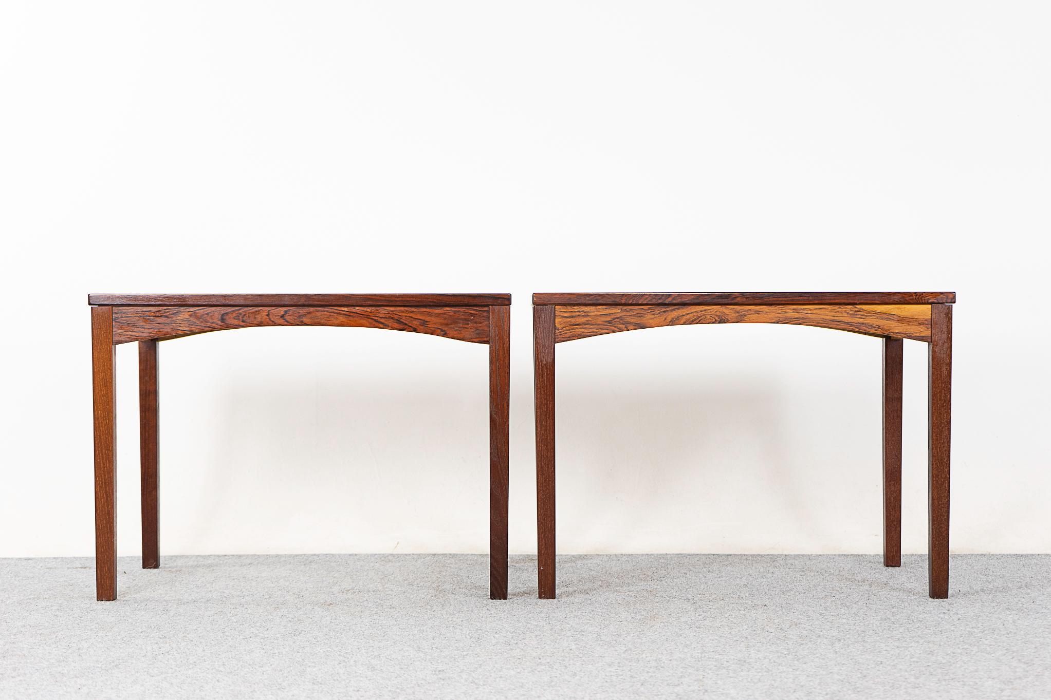 Rosewood side table pair, circa 1960's. Compact, highly funtional set, perfect for either side of your sofa! As-is. 

Please inquire for remote and international shipping rates.