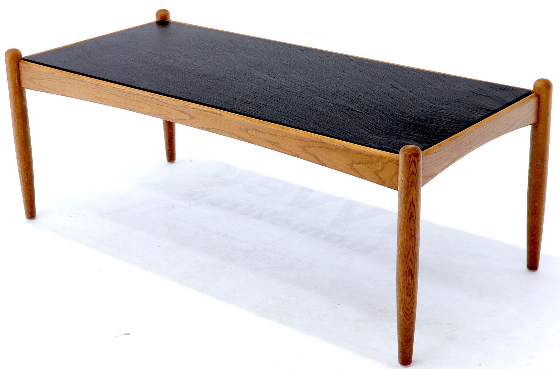 Rectangular Danish Mid-Century Modern slate top coffee table. Nice teak frame in style of Hans Wegner.