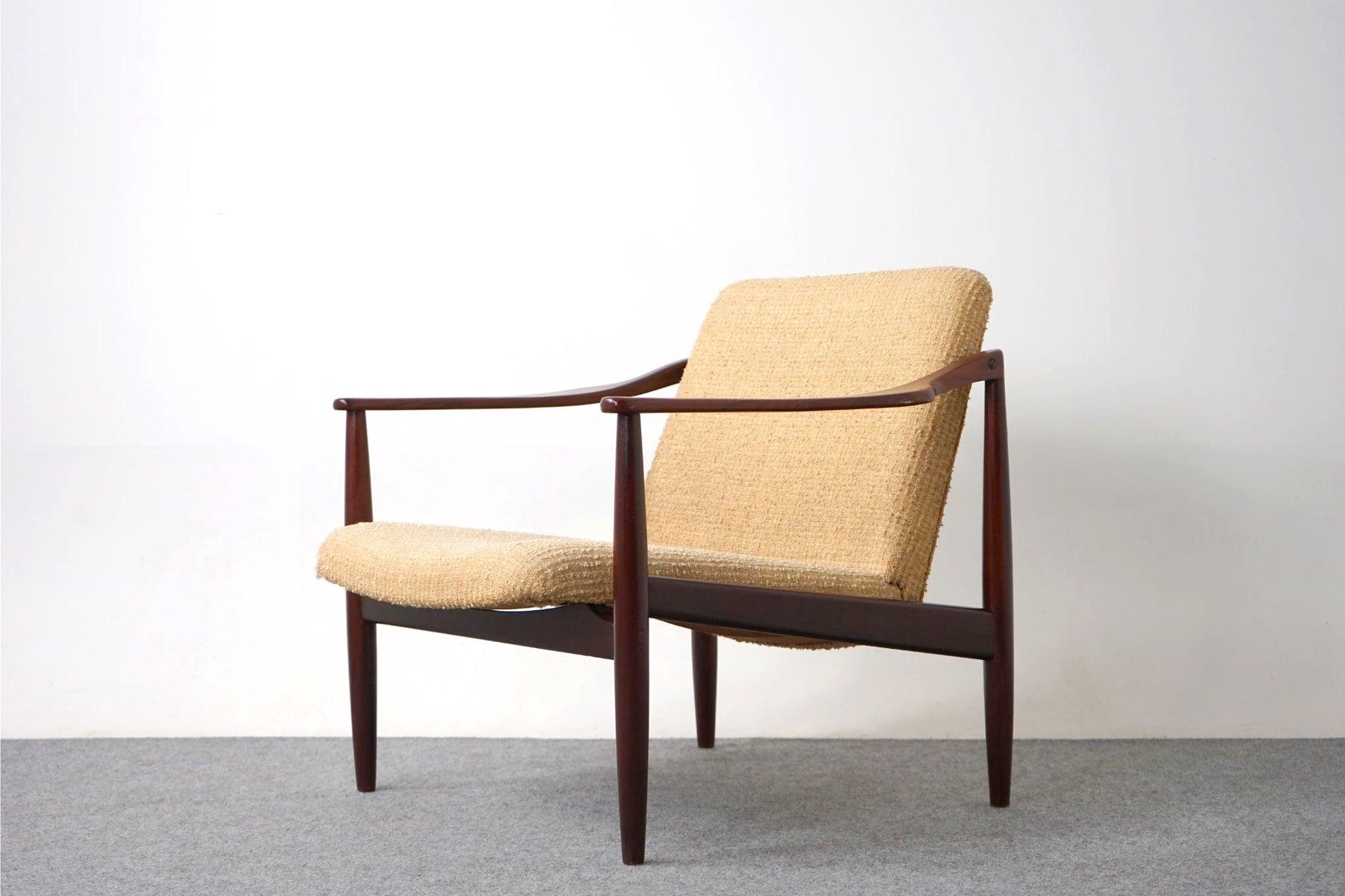 Teak Danish mid-century easy chair, circa 1960's. Sculpted teak frame with beautiful and smooth joinery. Clean modern solid wood frame with upholstered seat and back design is easy to combine with other furniture in your living room.

Unrestored