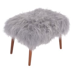 Danish Mid-century Modern stool reupholstered in grey sheep skin