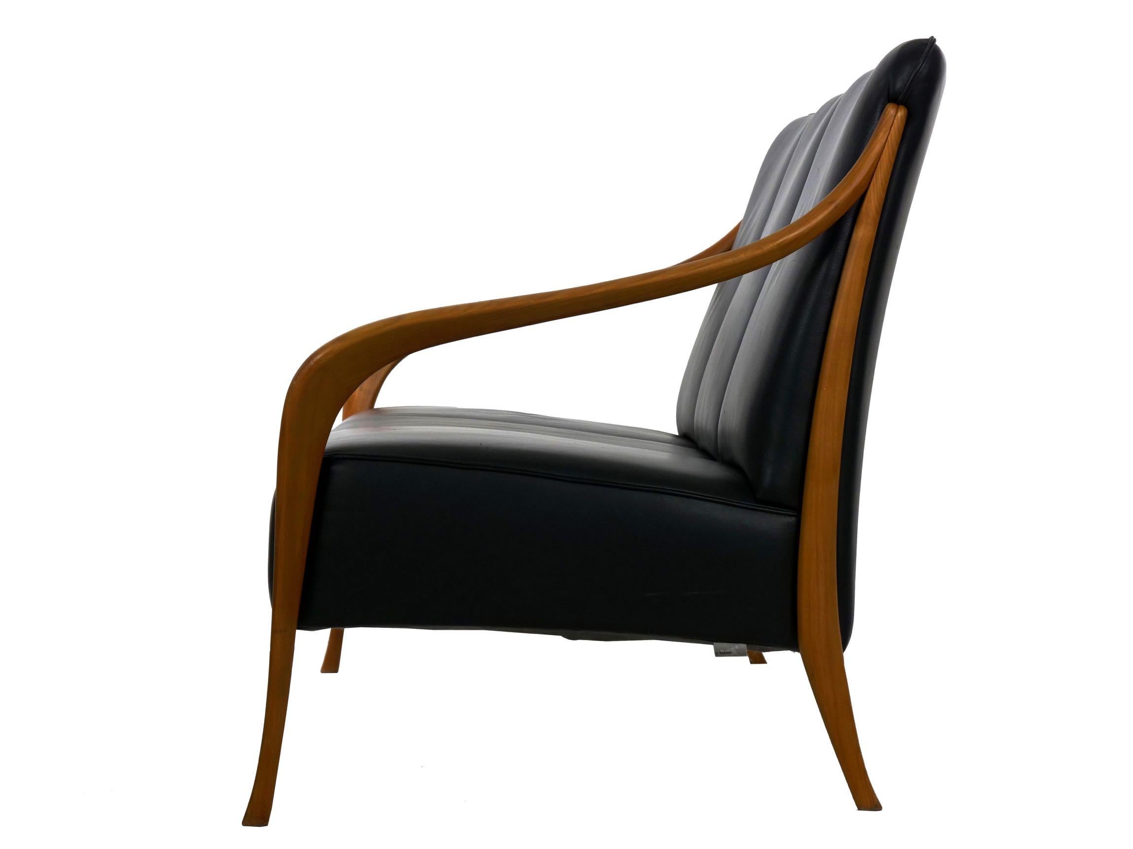 Scandinavian Danish Mid-Century Modern Style Sculpted Teak Black Leather Sofa by Wagner