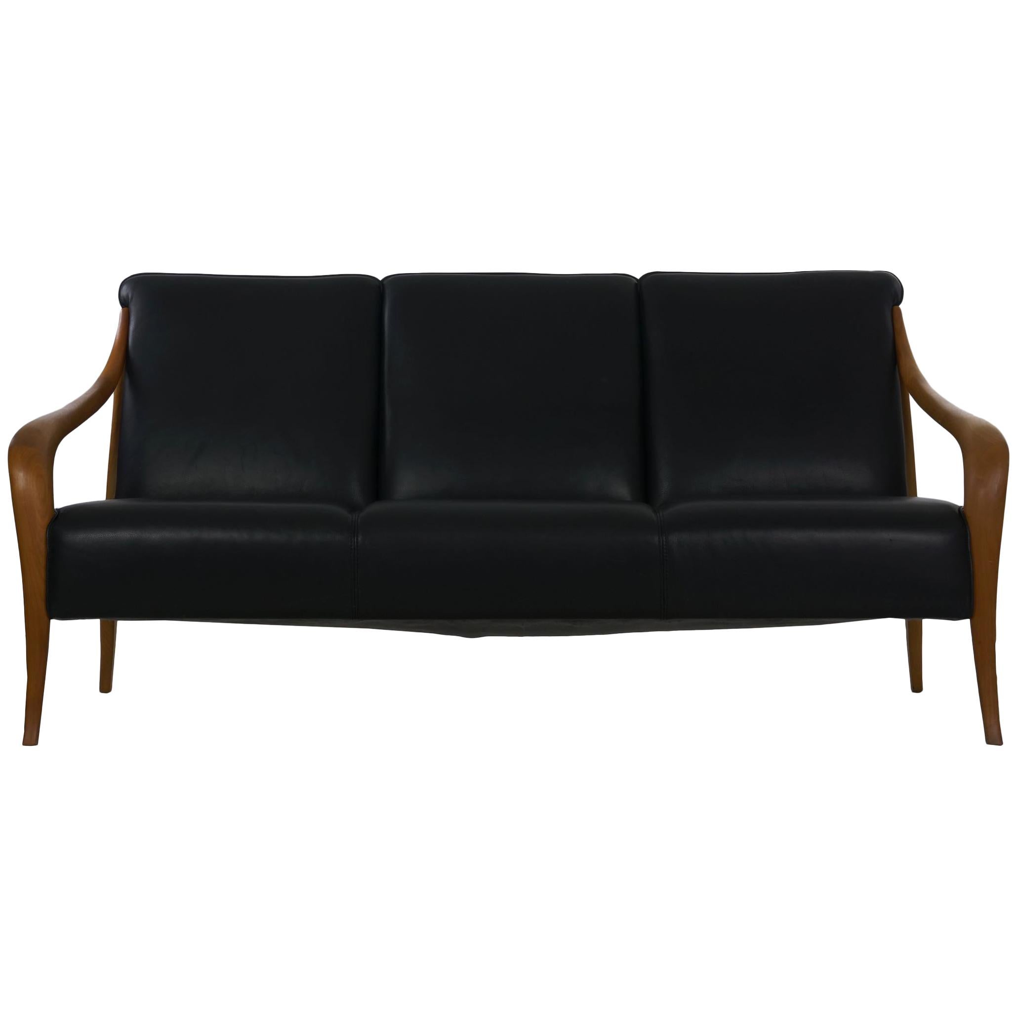 Danish Mid-Century Modern Style Sculpted Teak Black Leather Sofa by Wagner