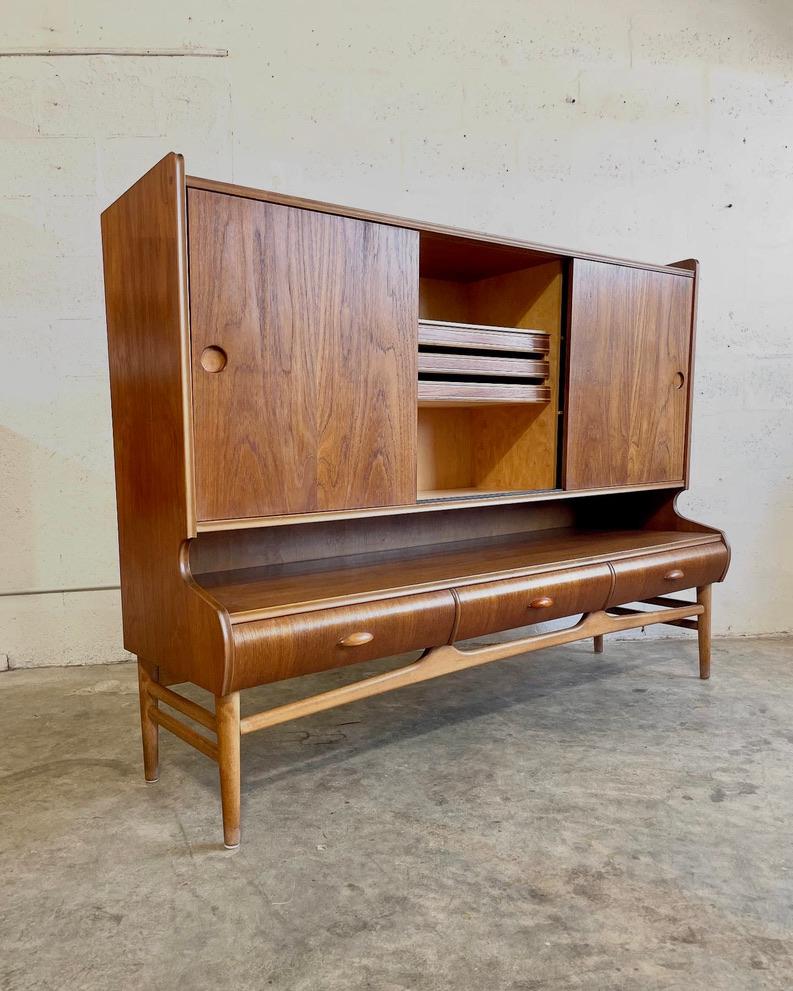 Danish Modern Tall Sideboard with lots of storage. Removable shelves. 65.75w 20.5d 51h