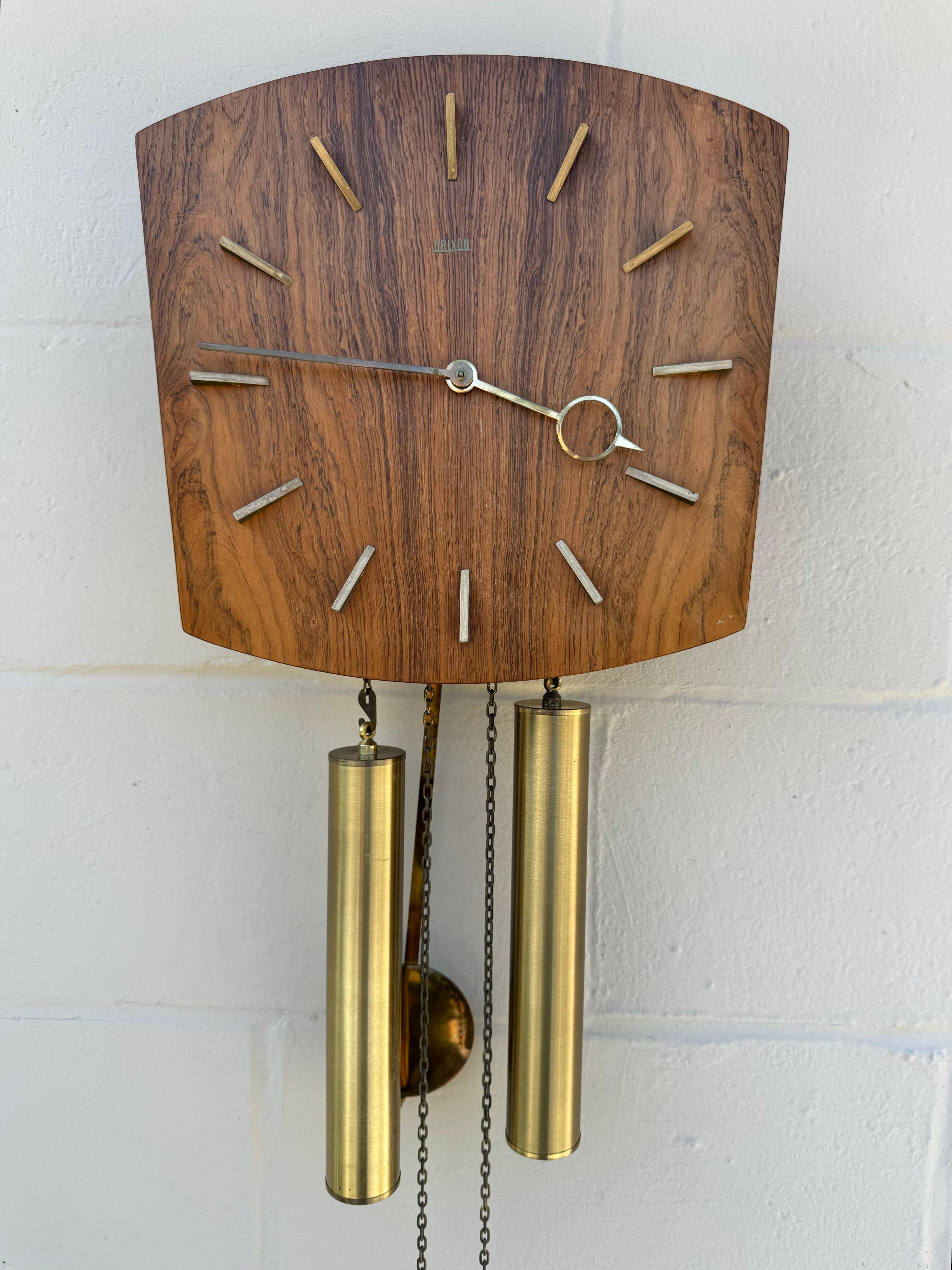 🕰️ Elevate Your Space with Vintage Elegance! 🕰️

Discover the Timeless Charm of Danish Mid-Century Modern Design!

Introducing our stunning Danish mid-century modern vintage teak wall clock, crafted with precision and style by Brixon in Denmark.