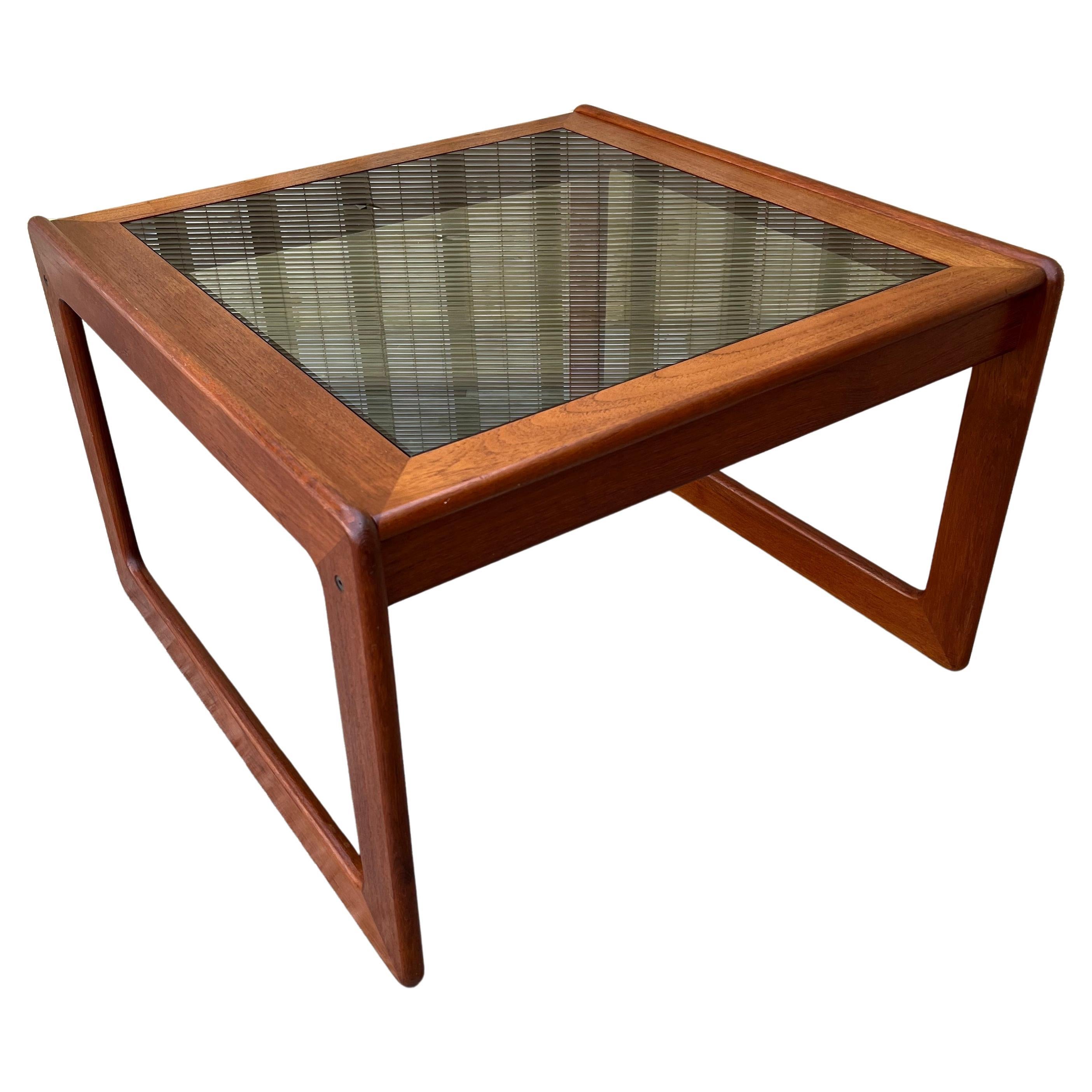 Danish Mid Century Modern Teak Coffee Table by Komfort Denmark, Circa 1960s. 