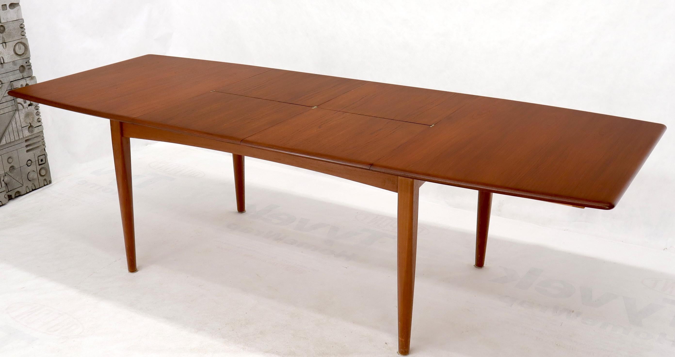 Lacquered Danish Mid-Century Modern Teak Dining Table with Two Pop Up Self Storing Leaves For Sale