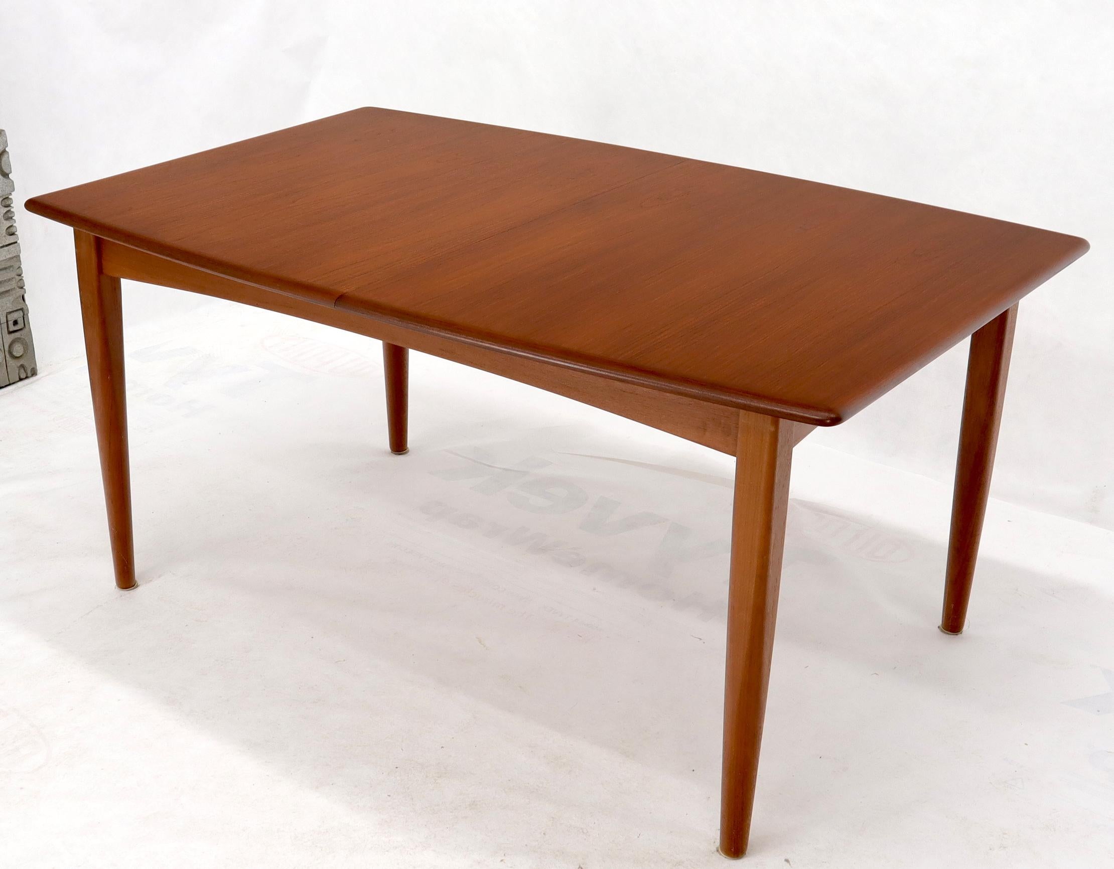 Danish Mid-Century Modern Teak Dining Table with Two Pop Up Self Storing Leaves For Sale 1