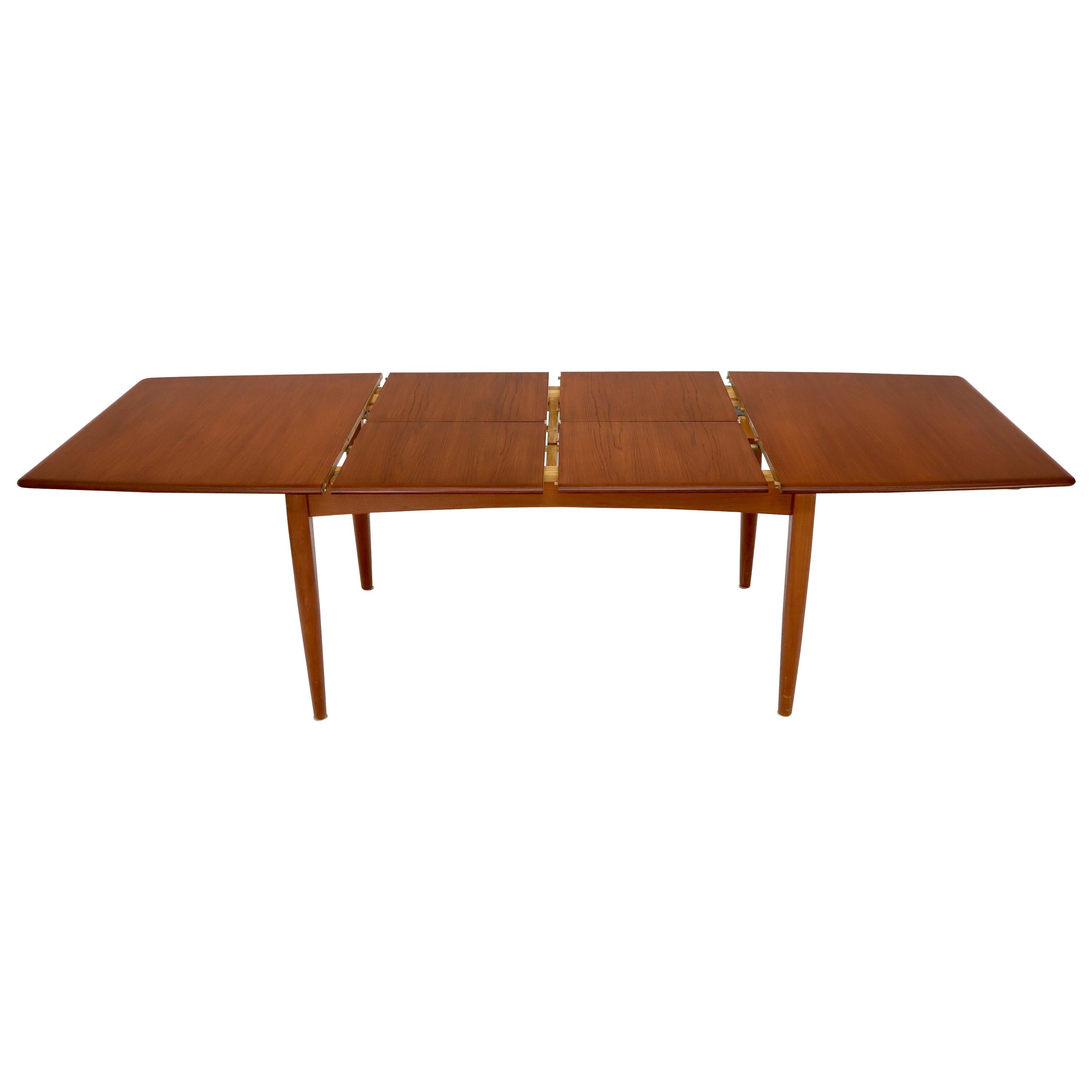 Danish Mid-Century Modern Teak Dining Table with Two Pop Up Self Storing Leaves For Sale