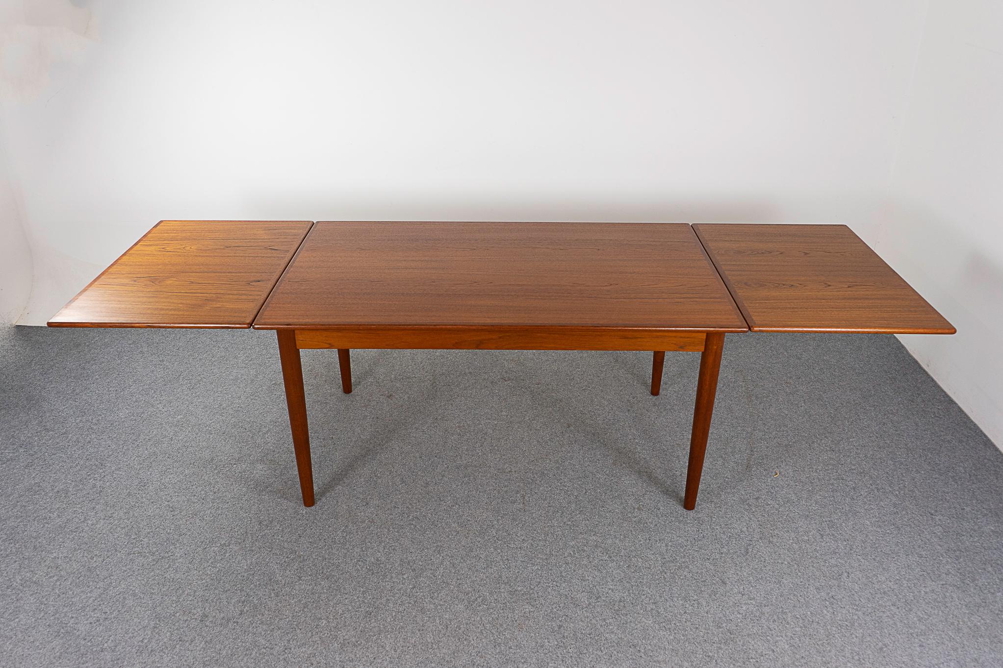 Danish Mid-Century Modern Teak Draw Leaf Dining Table For Sale at 1stDibs
