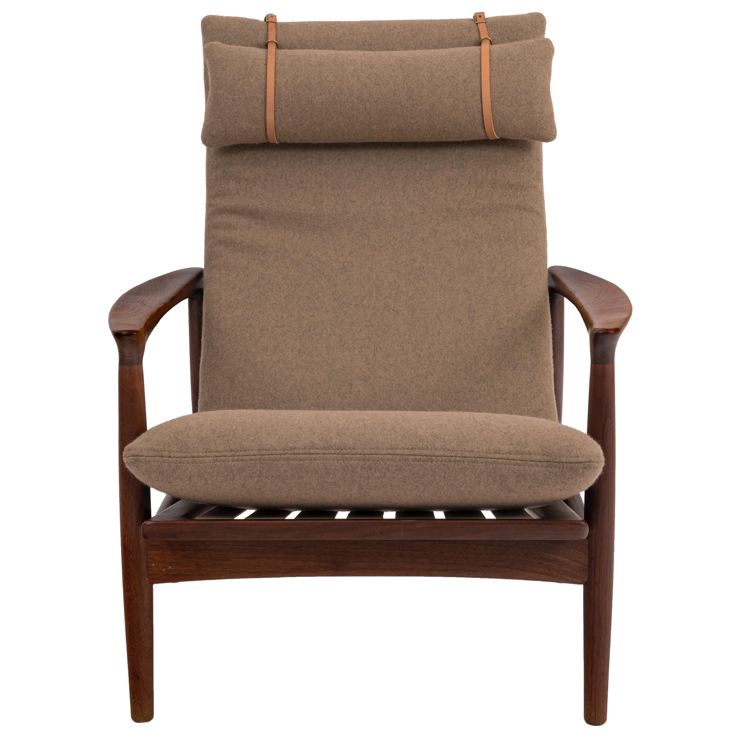 A good original Danish Mid Century Modern teak & upholstered armchair, designed by Arne Vodder, circa 1960.
The chair cushions have just been professionally re-upholstered to a very high standard in a quality light brown wool, with head rest