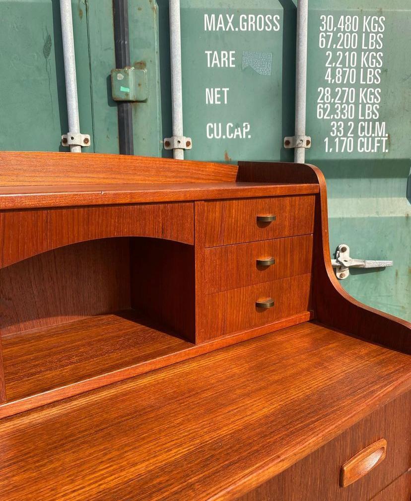 Brass Danish Mid Century Modern teak secretary dresser, made in the 1960s. For Sale