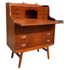 Danish Mid Century Modern teak secretary dresser, made in the 1960s.