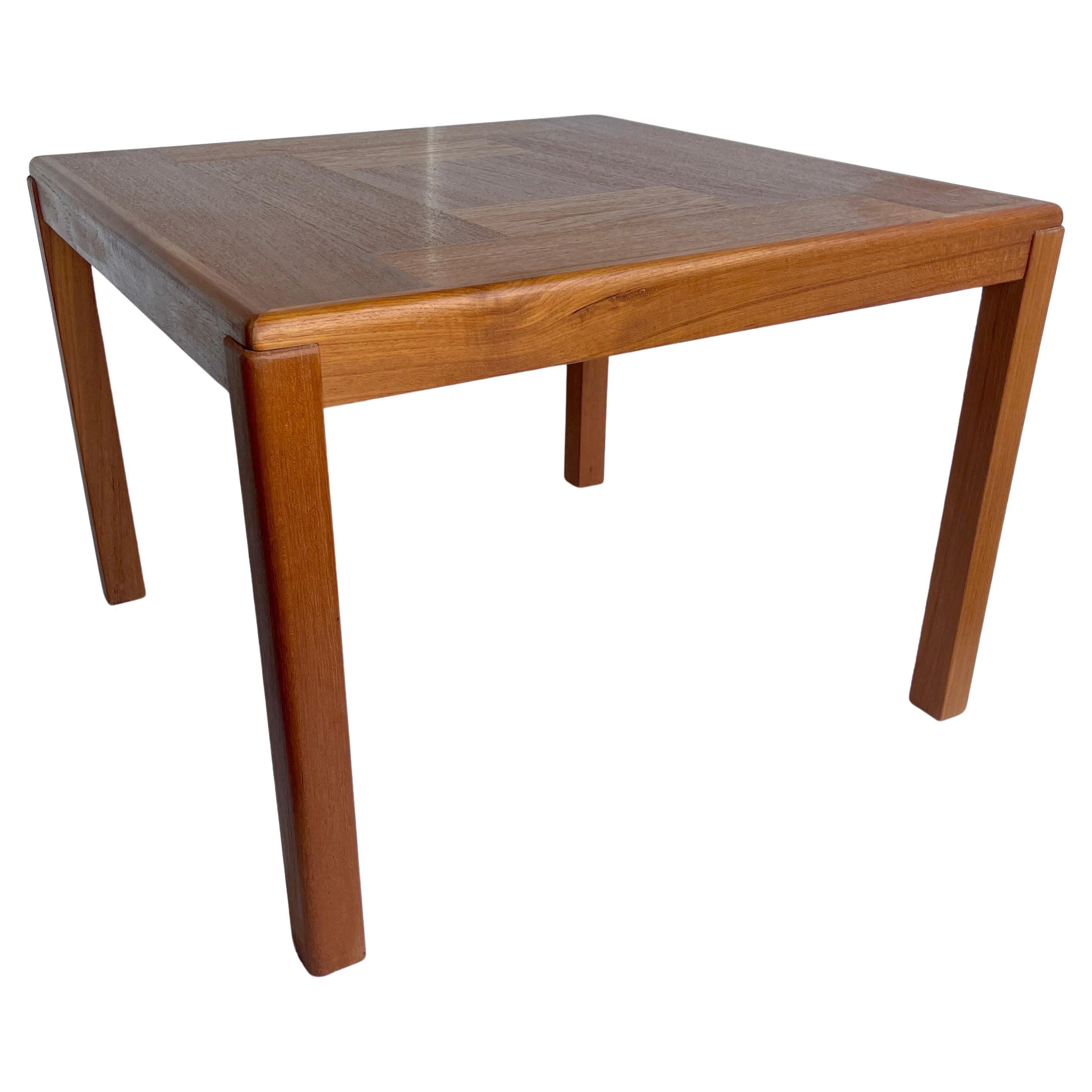 Square light teak wood coffee table in classical Scandinavian Modern style, manufactured by 