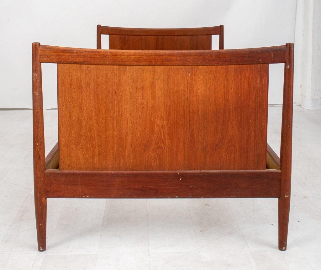 Peter Hvidt (Danish, 1916-1986) and Orla Molgaard-Nielsen (Danish, 1907-1993) for Soborg Mobler, 1960s, Mid-Century Modern teak single bed, apparently unmarked, rectangular the headboard and footboard with 