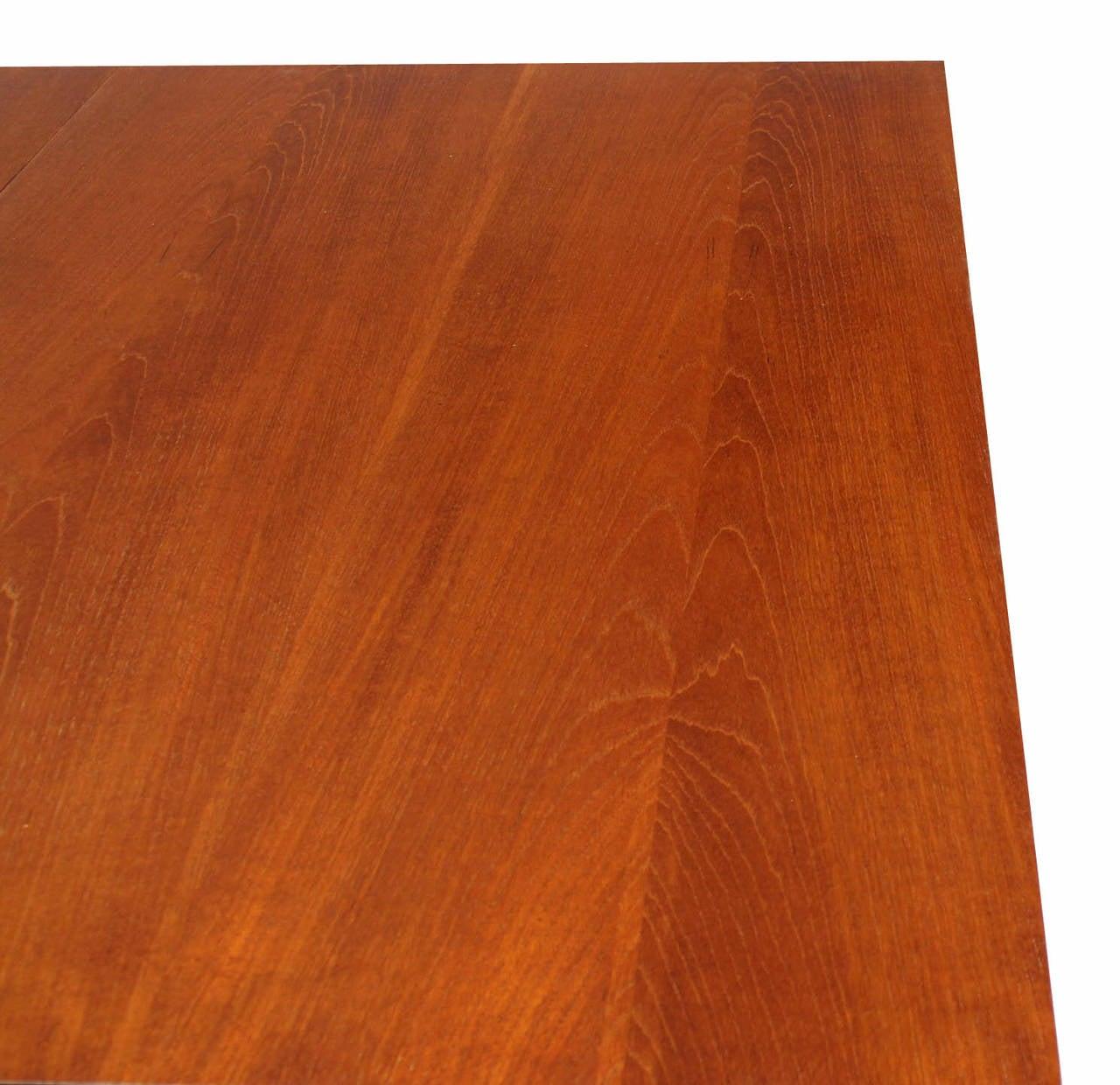Lacquered Danish Mid Century Modern Teak Tapered Legs Dining Conference Table Two Leaves  For Sale