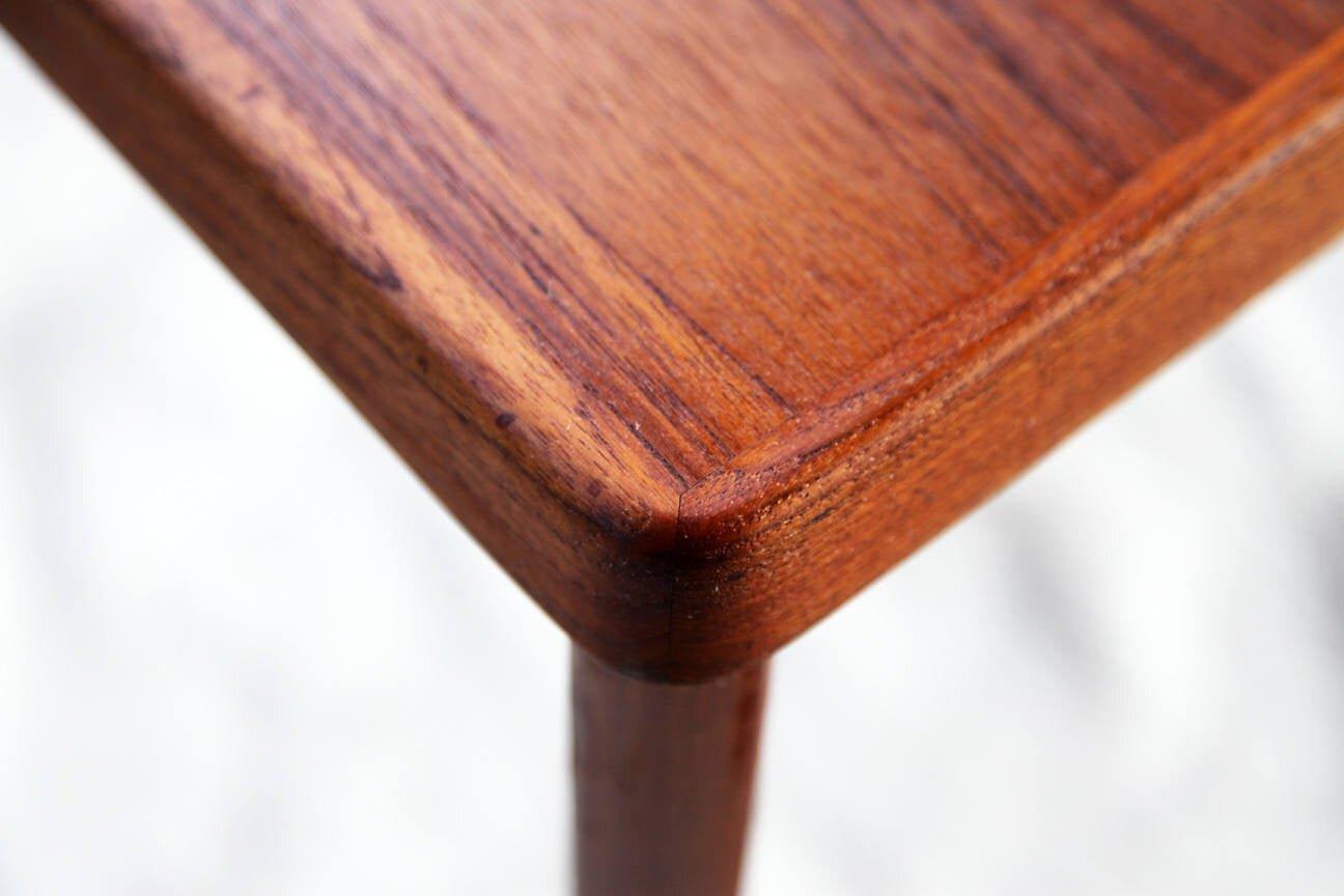 This table features absolutely stunning Teak wood grain. This Vintage mid-20th century Danish teak cocktail table designed by Vejle Stole & Mobelfabrik, Denmark, circa 1960s. The table is in refinished condition. Marked underneath.

Made in