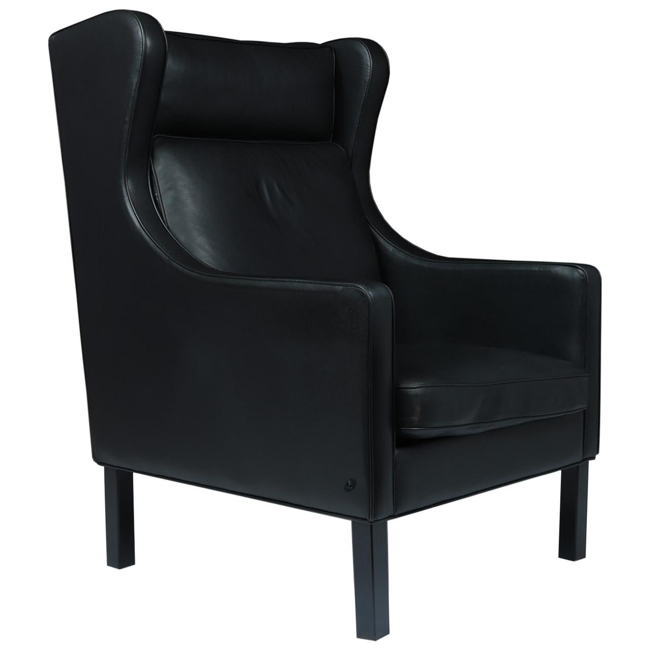 Danish, Mid-Century Modern, Wing Chair in Black Leather by Hurup, circa 1980 For Sale