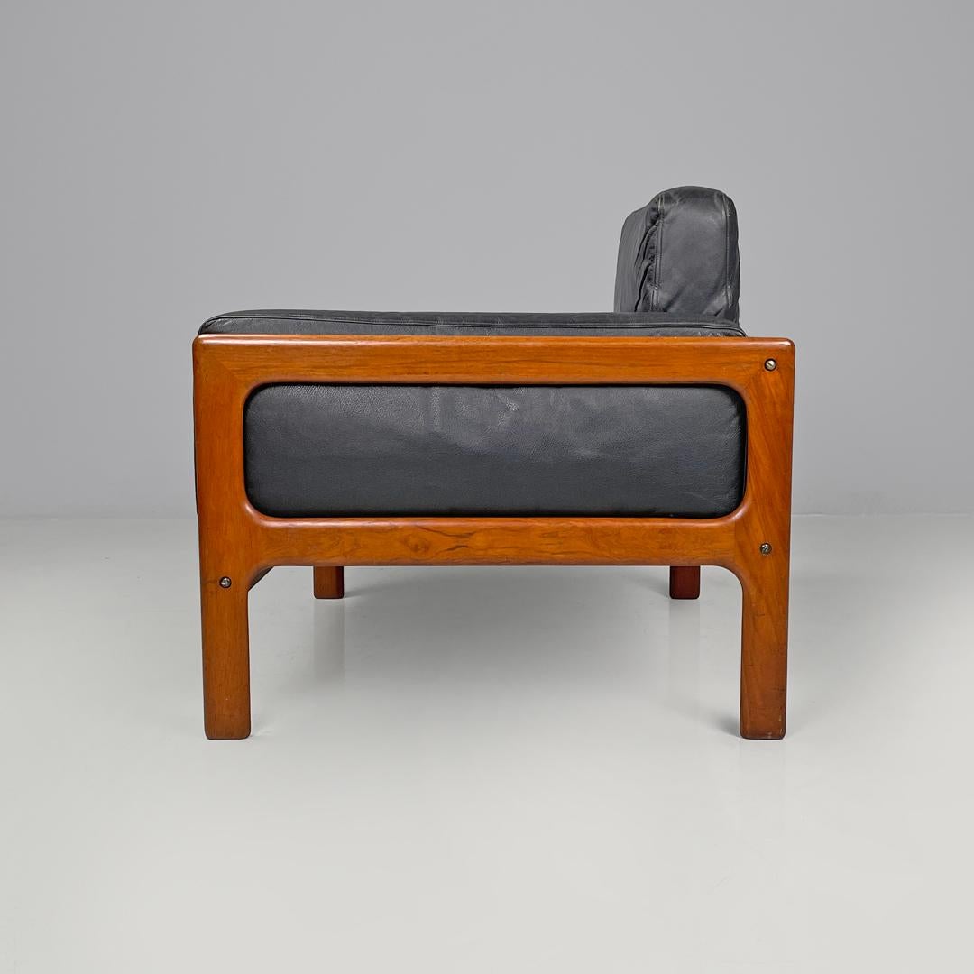 Mid-20th Century Danish mid-century modern wood and black leather armchairs, 1960s For Sale