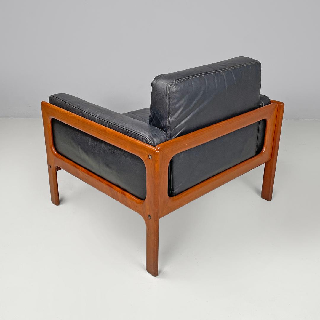 Leather Danish mid-century modern wood and black leather armchairs, 1960s For Sale