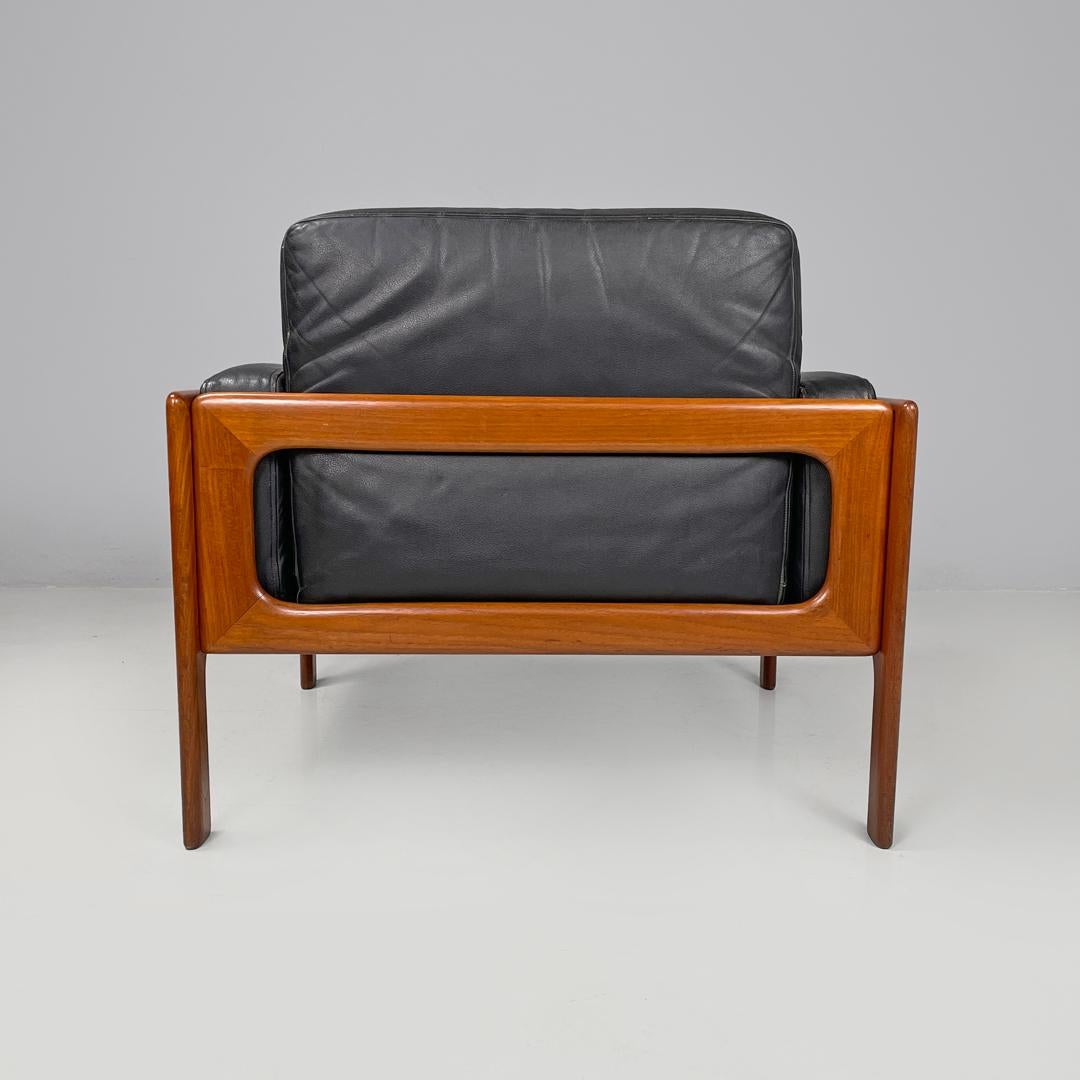 Danish mid-century modern wood and black leather armchairs, 1960s For Sale 1