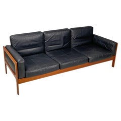 Danish mid-century modern wood and black leather three-seater sofa, 1960s