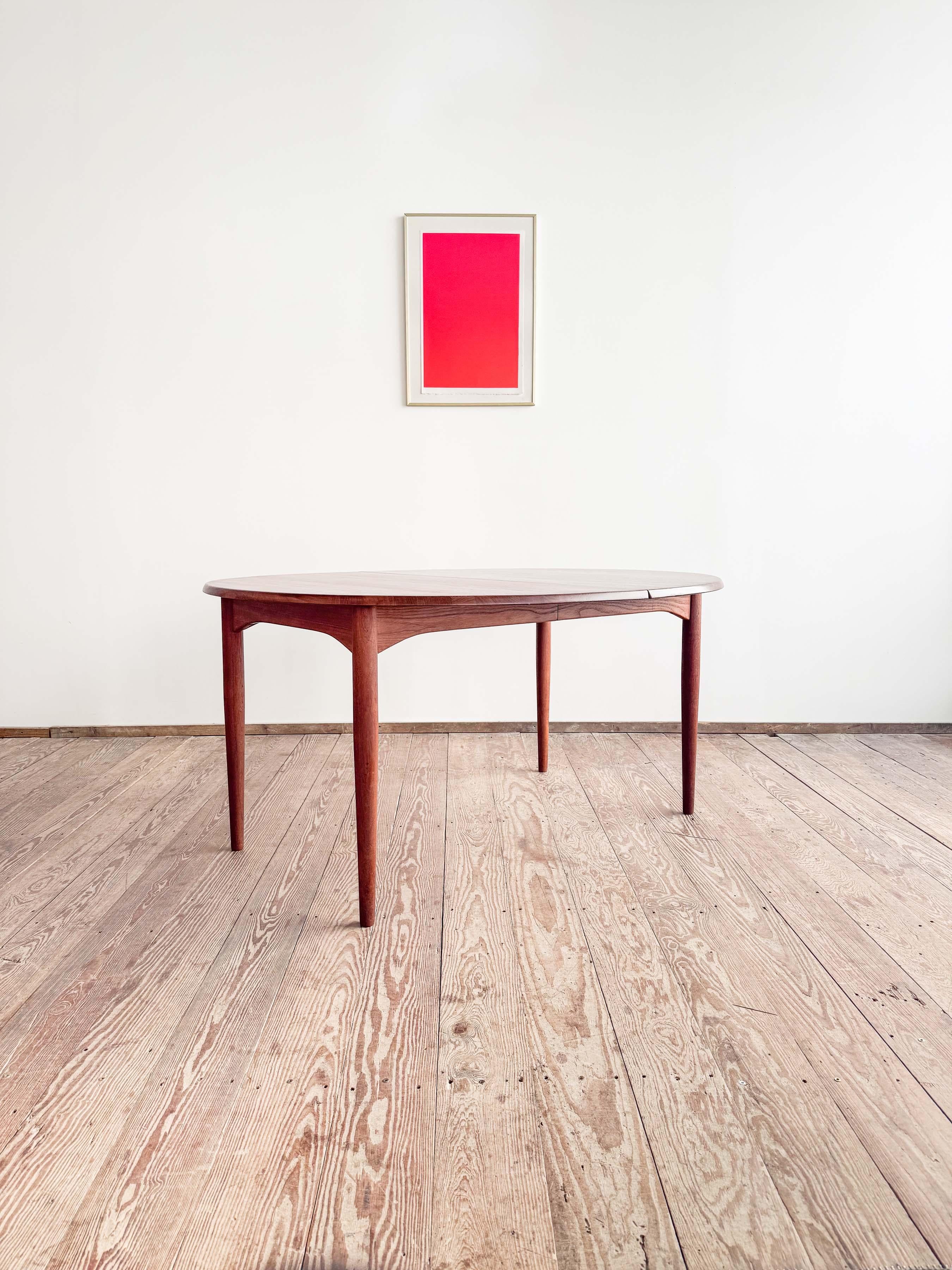 Dimensions: 146 / 194 / 242 x 119 x 72.5 cm (Length1 / Length2 / Length3 x Width x Height)

(approx. 57.5 / 76.4 / 95.3 x 46.9 x 28.5 inches)

This Danish dining table, crafted from solid teak, was designed and manufactured in Denmark. It features