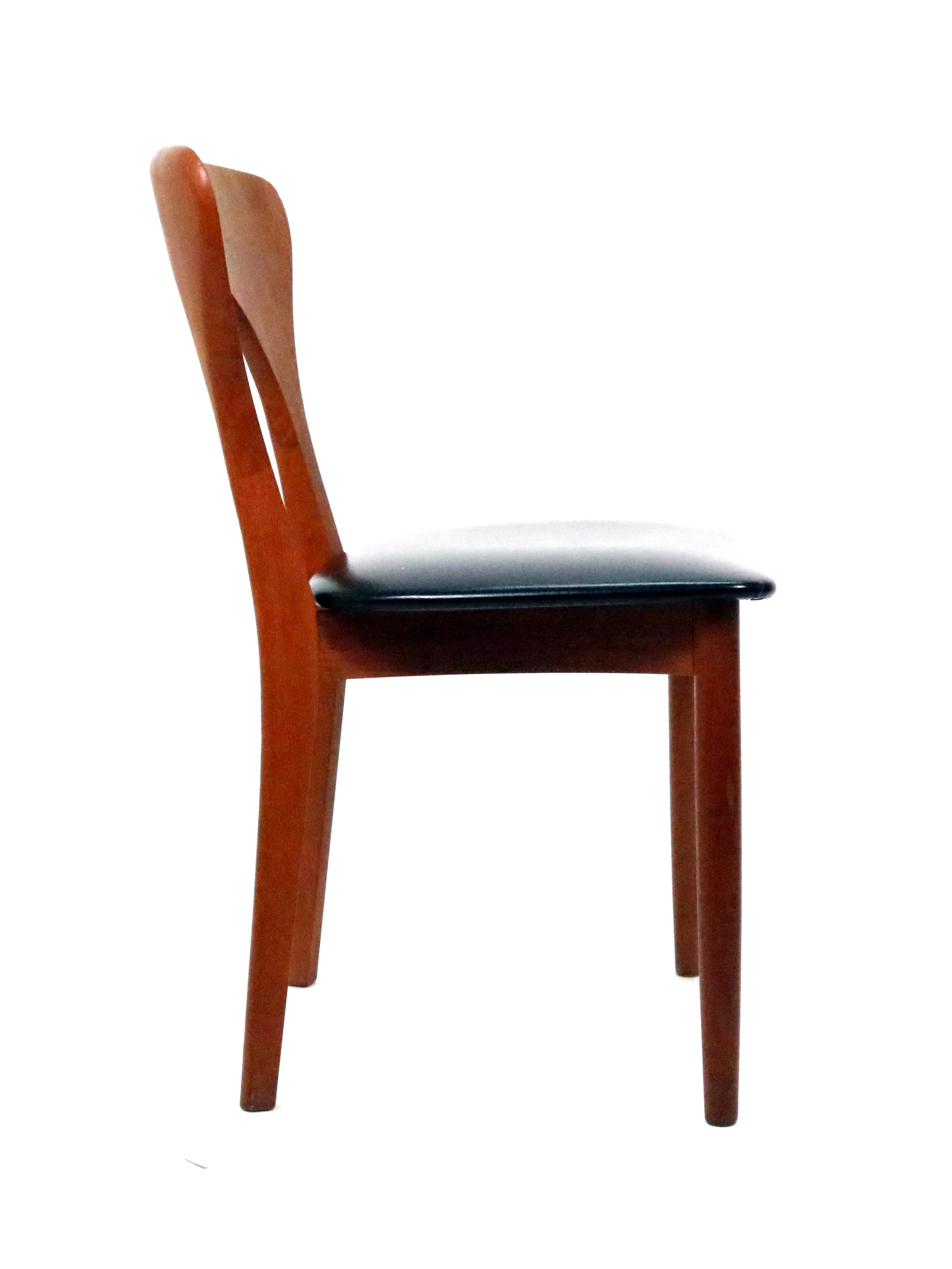 A handsomely sculpted 'Peter' teak dining or desk chair with black faux leather seat by Niels Koefoed for Koefoeds Hornslet.