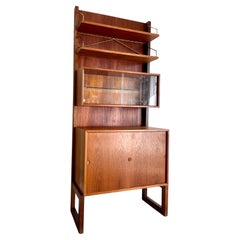 Mueble librería independiente danés de mediados de siglo Poul Cadovius
