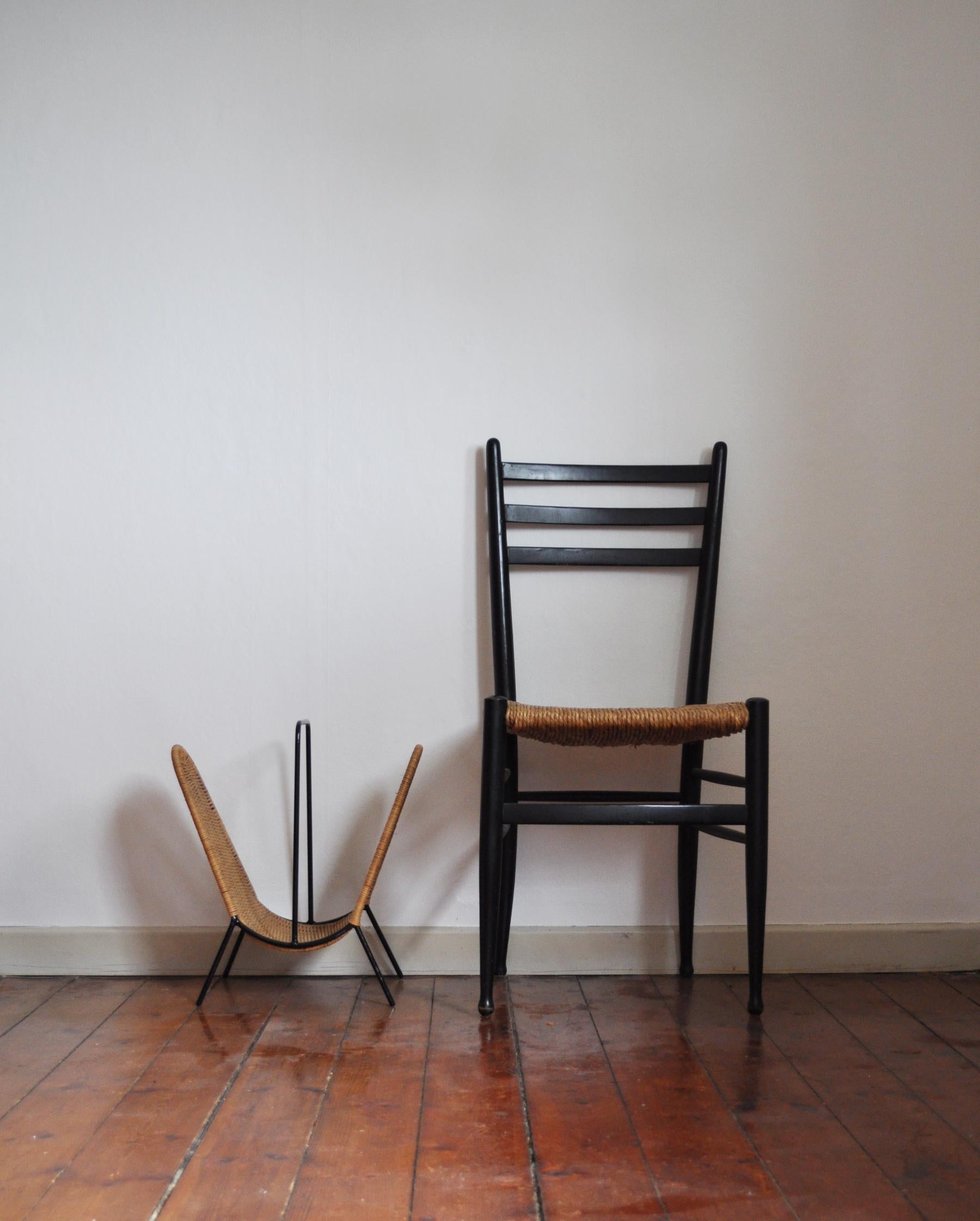 Danish Modern Rattan Magazine Rack attributed to Carl Auböck, 1960s For Sale 1