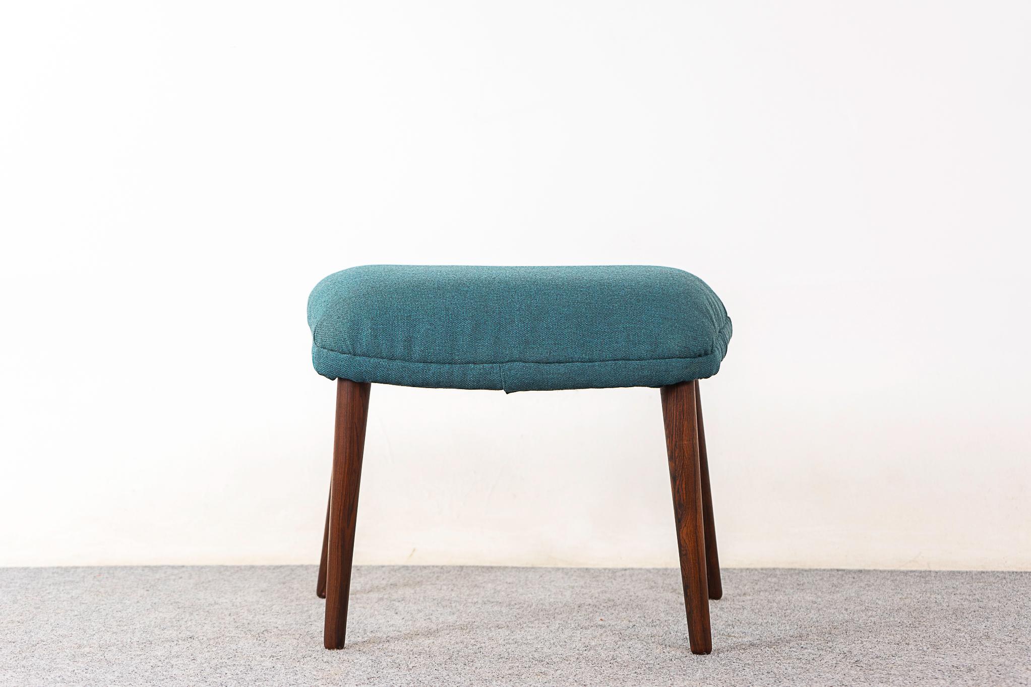 Rosewood Danish footstool by SL Mobler, circa 1960's. Angled ergonomic design with sleek legs. SL Mobler maker's mark intact.