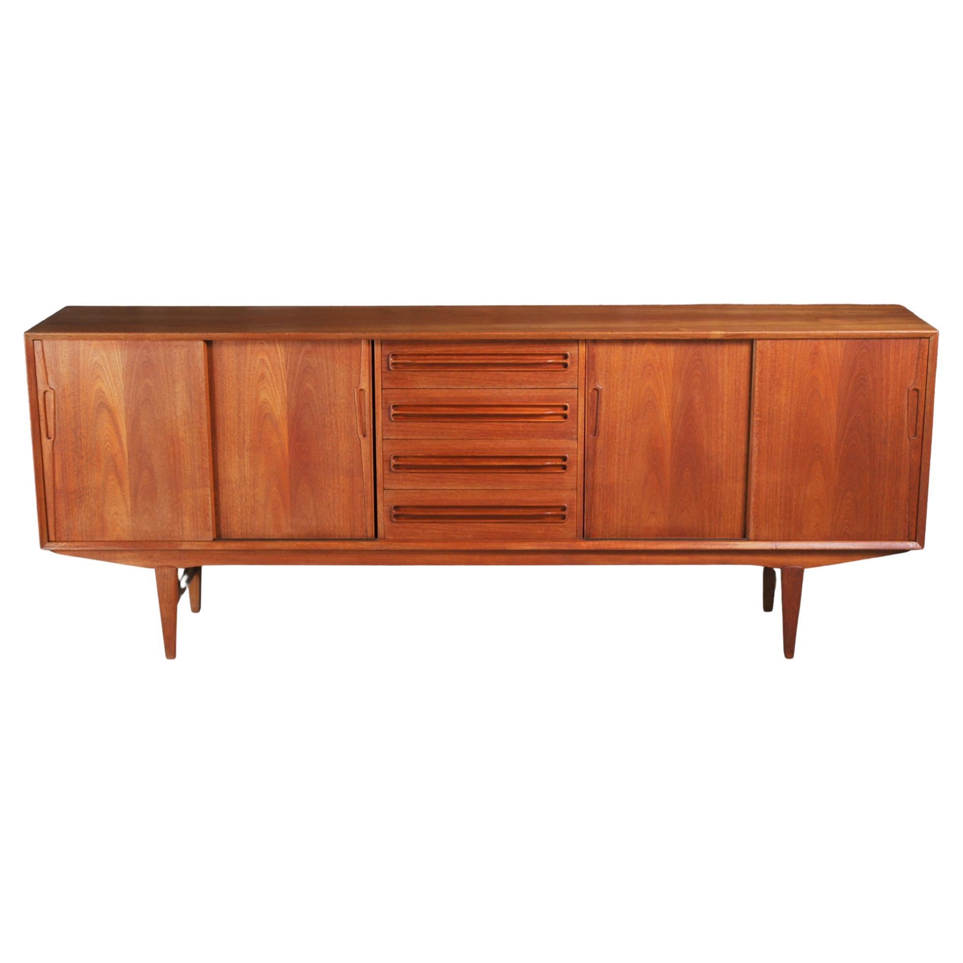 Teak Mid Century Sideboard with curved shaped legs at 1stDibs