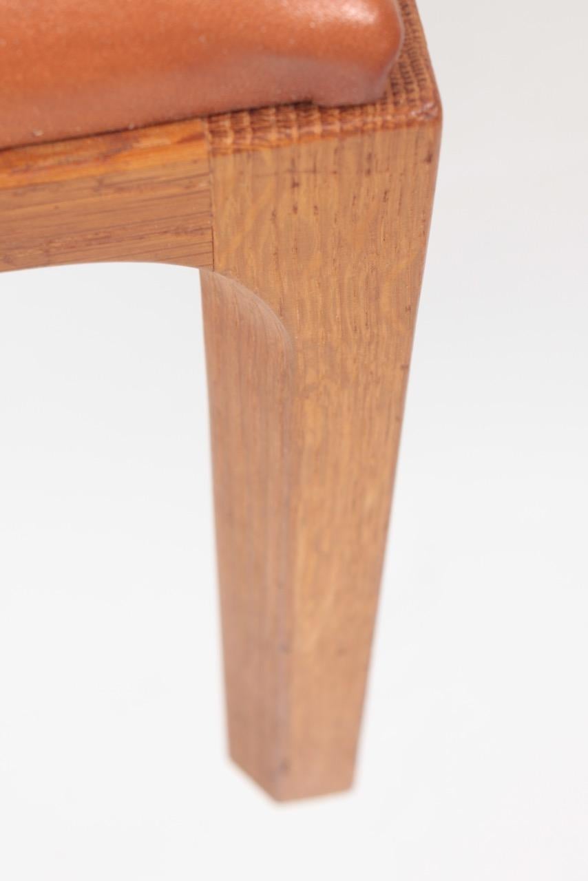 Danish Midcentury Stool in Patinated Leather and Oak by Kai Kristiansen 1