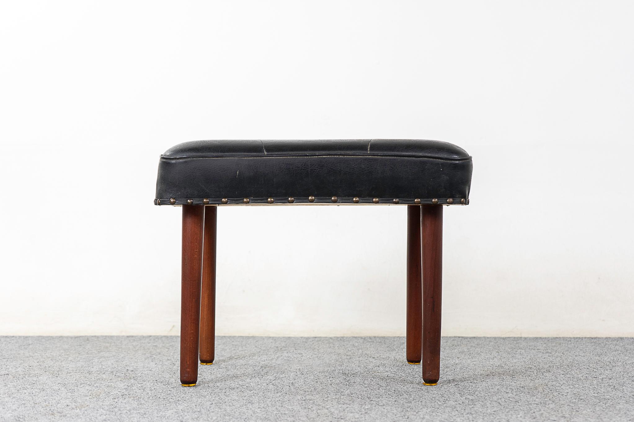 Teak Danish footstool, circa 1960's. Removeable legs and original upholstery with minor wear and tear. 