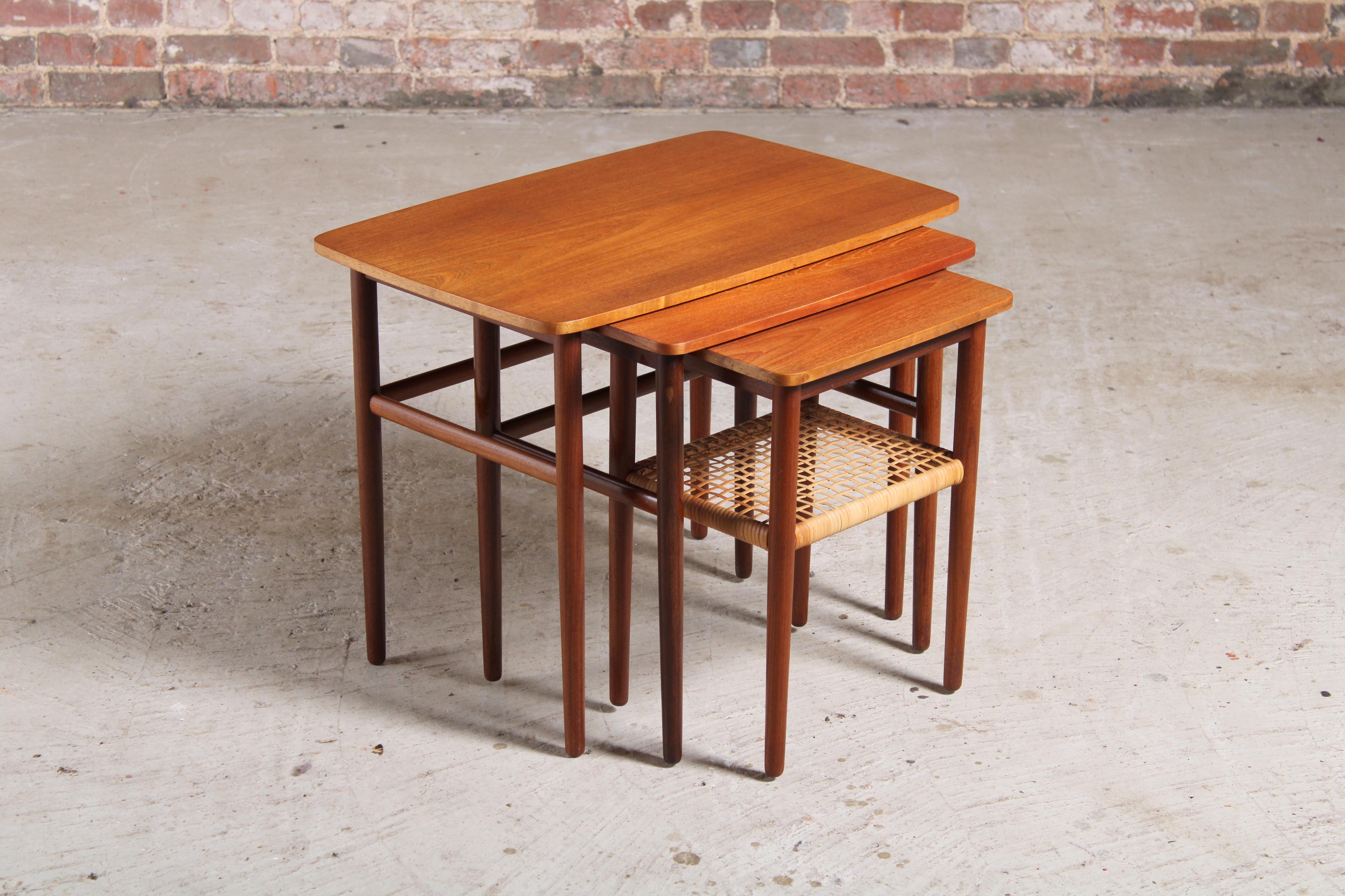 Danish Mid Century Teak Nest of Tables with Rattan Magazine Shelf In Good Condition In Surrey, GB