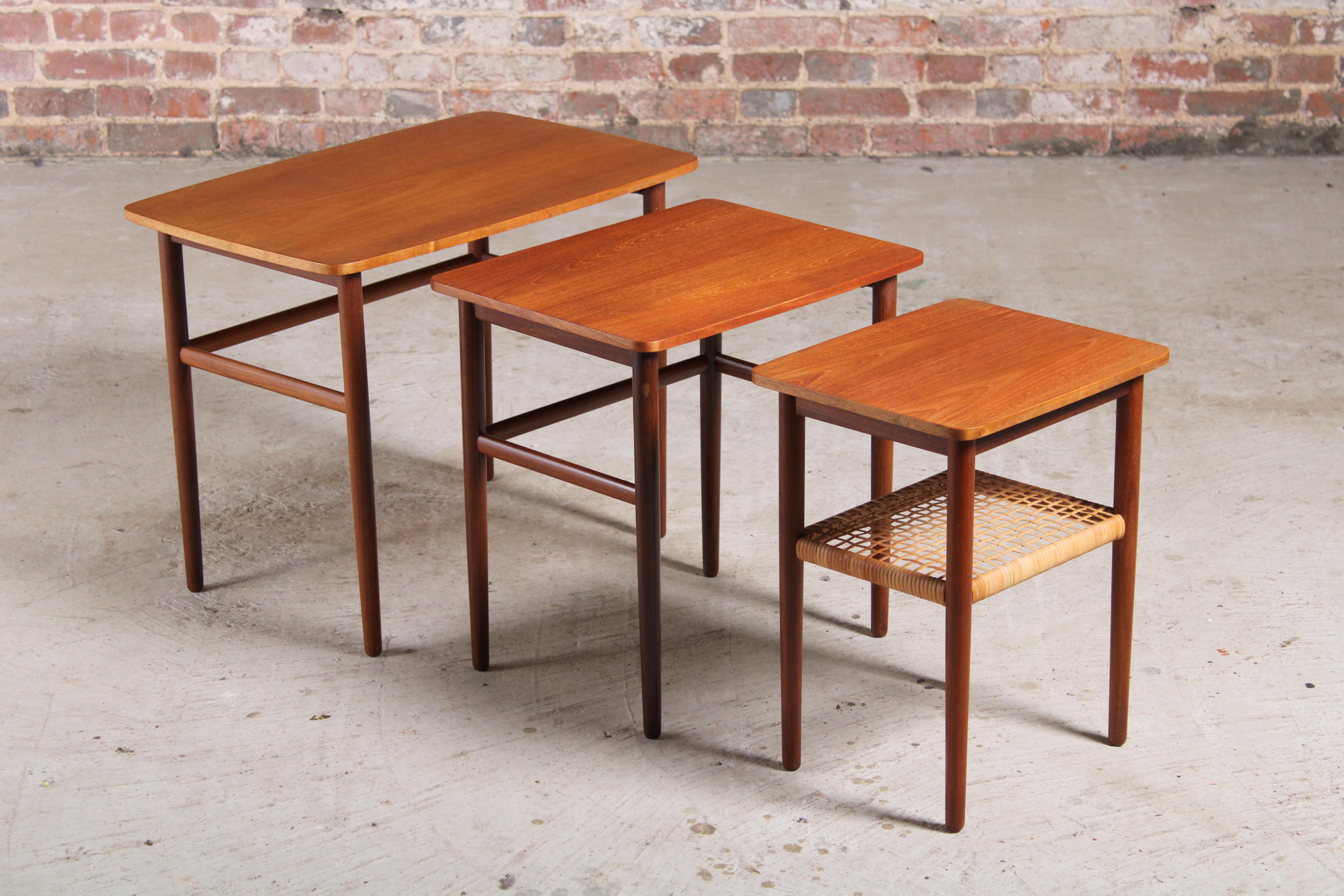 20th Century Danish Mid Century Teak Nest of Tables with Rattan Magazine Shelf