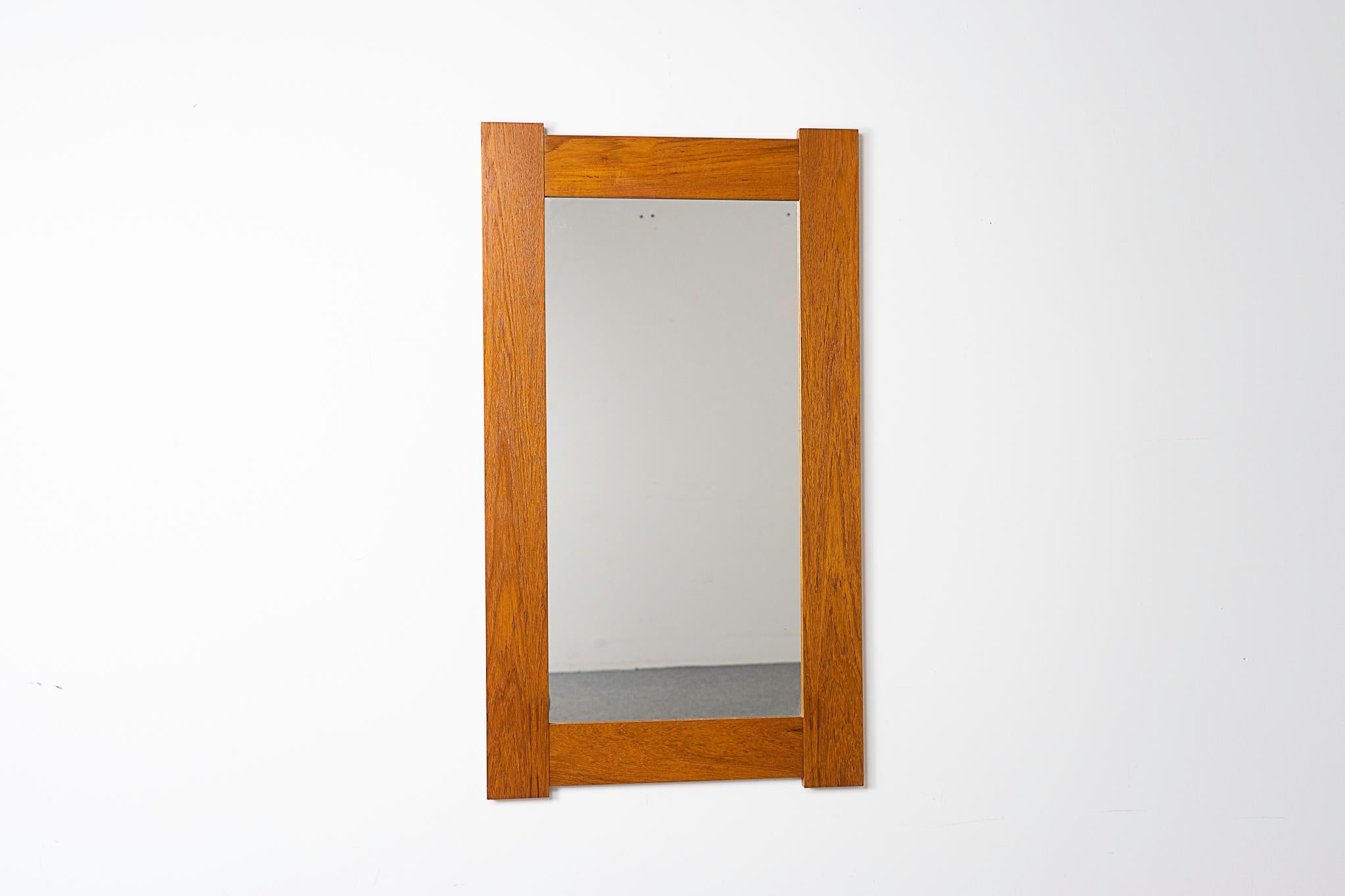 Teak Danish mirror, circa 1960's. A perfect compliment to any interior! The glowing tone will warm up any interior.

Please inquire for remote and international shipping rates.