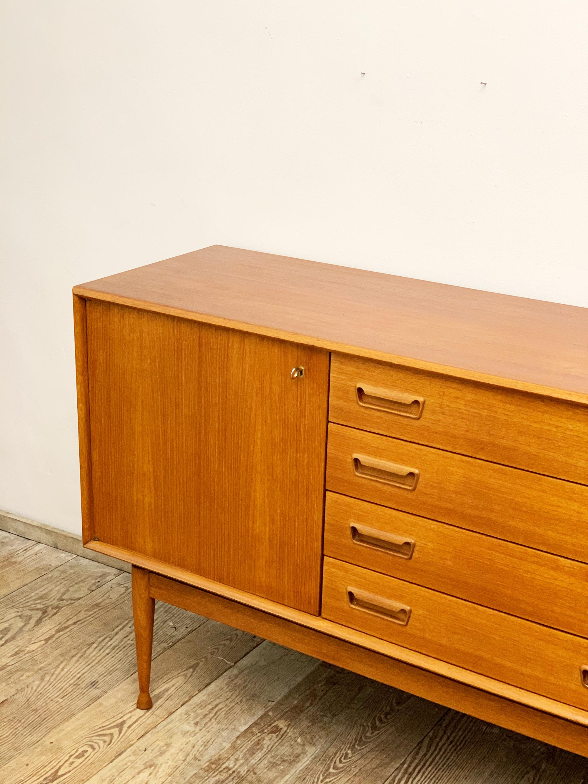 Mid-20th Century Danish Mid-Century Teak Sideboard or Credenza with Sculpted Legs, Denmark, 1950s