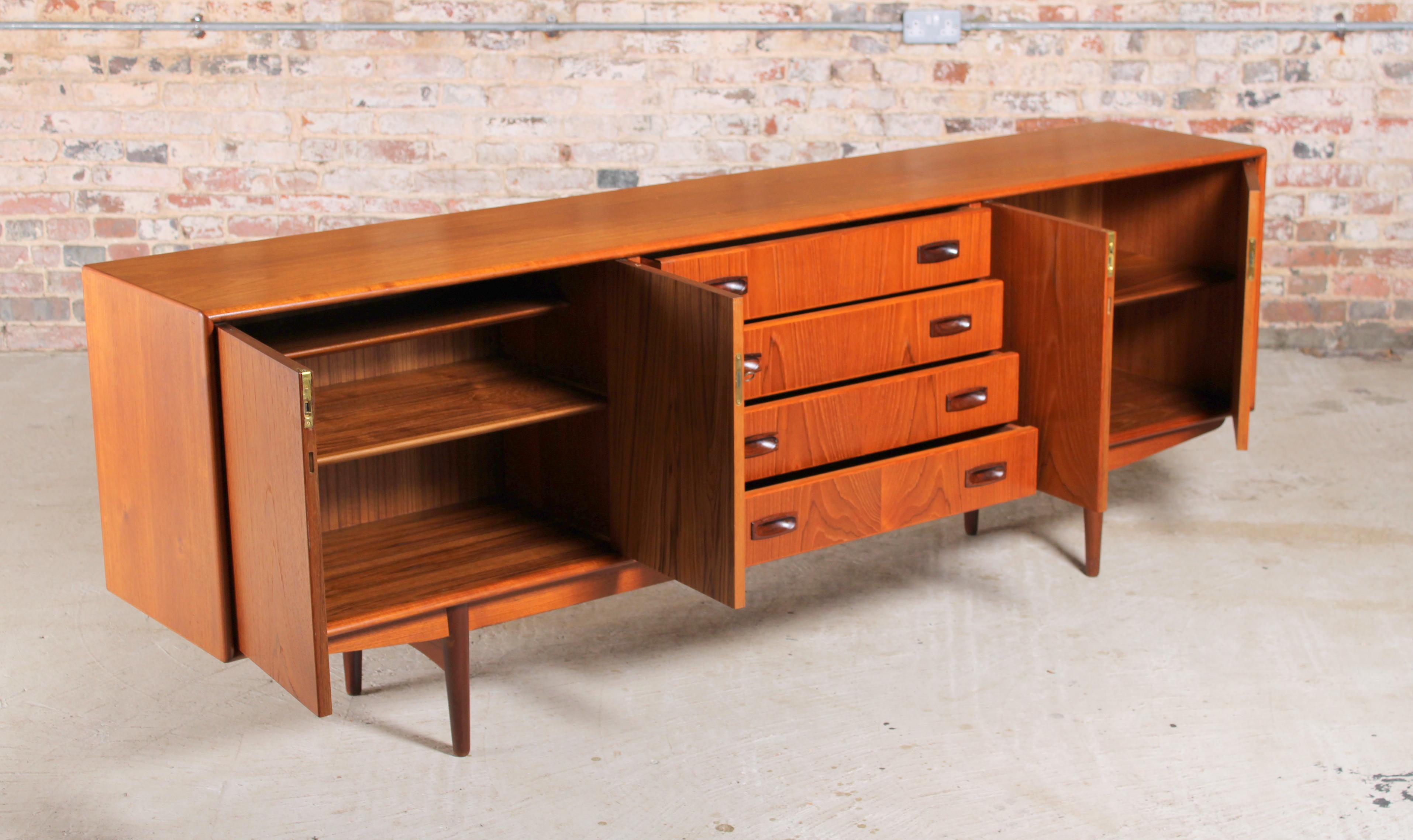 Mid-Century Modern Danish Mid Century Teak Sideboard with Carved Rosewood Handles For Sale