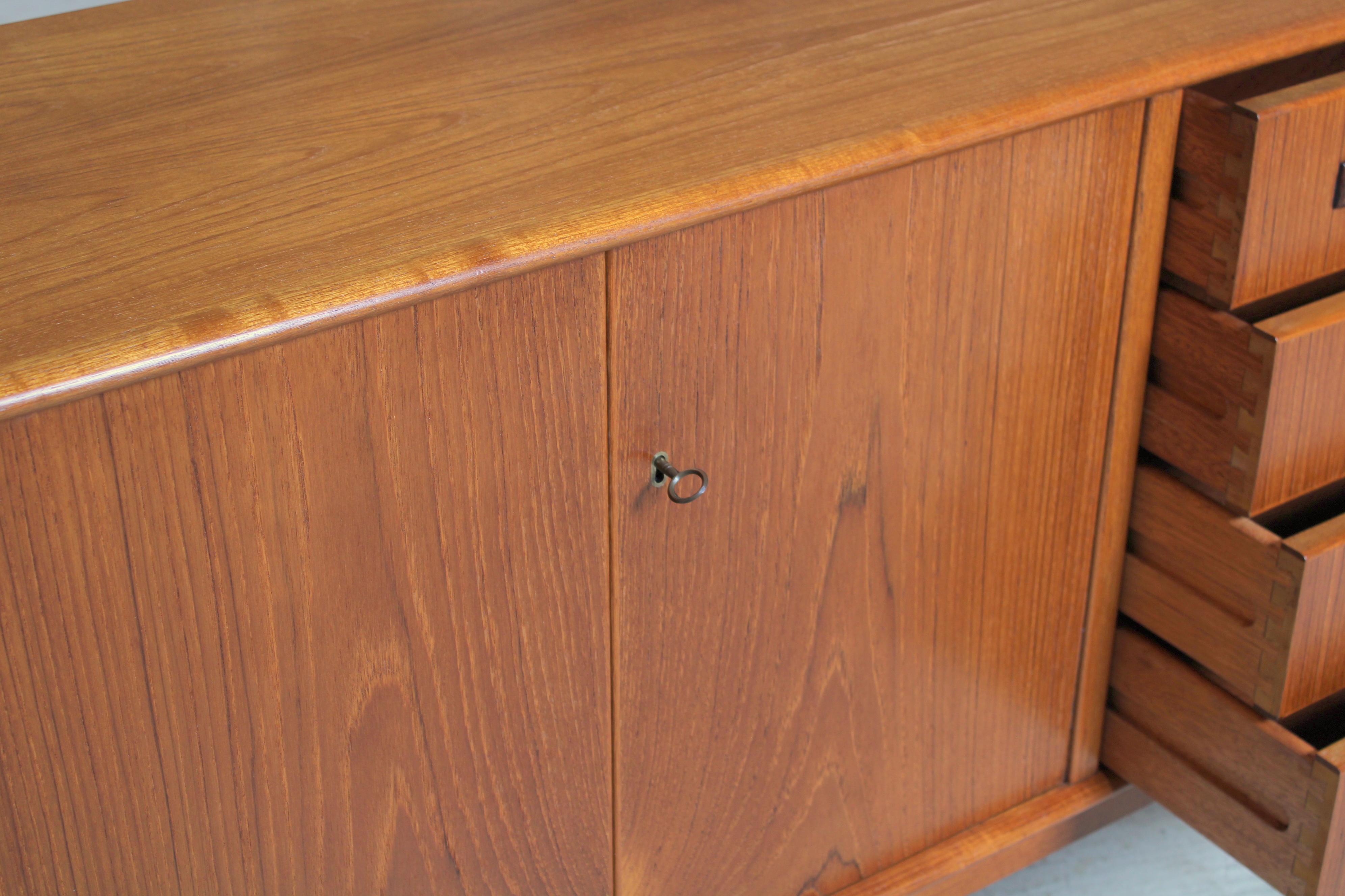 20th Century Danish Mid Century Teak Sideboard with Carved Rosewood Handles For Sale