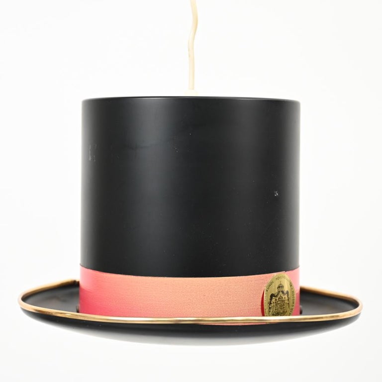 A fun and playful Danish mid-century top hat-form pendant light designed by Hans-Agne Jakobsson for Markyard, Sweden, 1960's. With original decal to 
