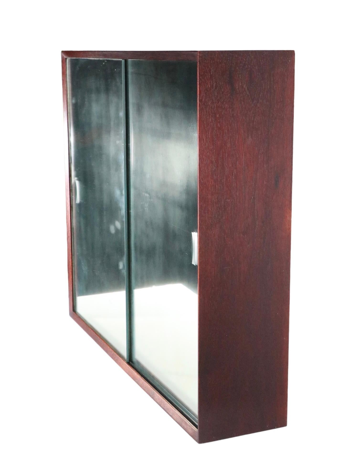 Danish Mid Century Wall Hanging Cabinet with Sliding Mirrored Doors, circa 1950s For Sale 9