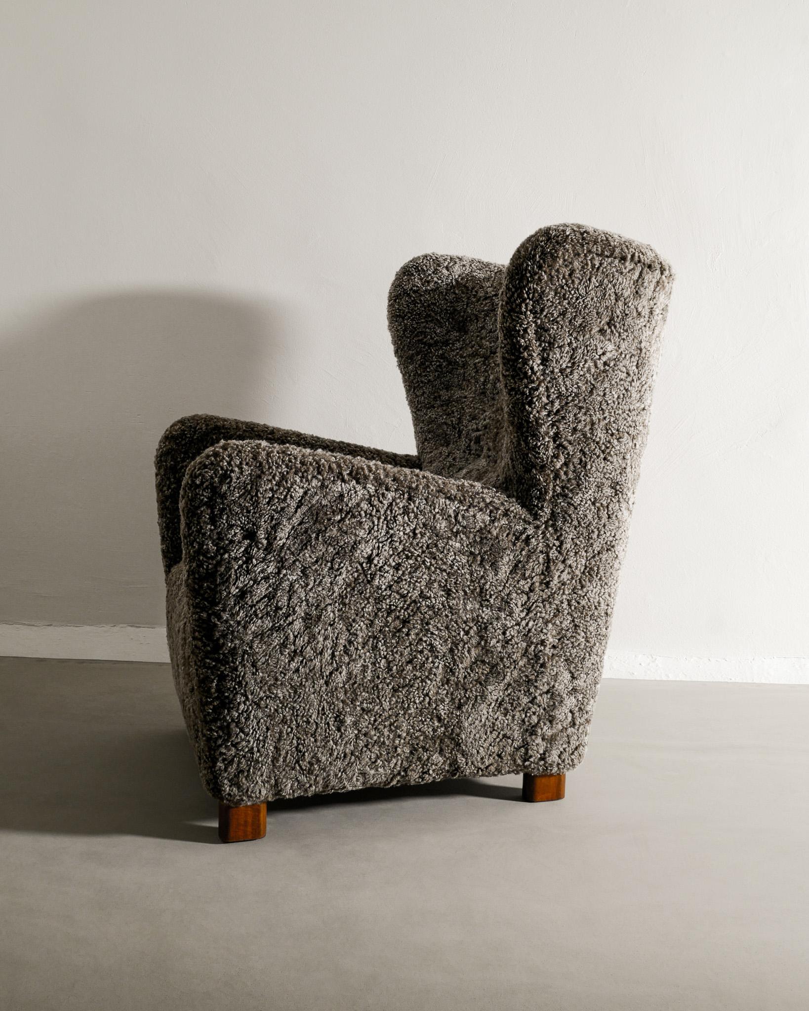Danish Mid Century Wingback Armchair with Sheepskin Produced in Denmark, 1940s  For Sale 2