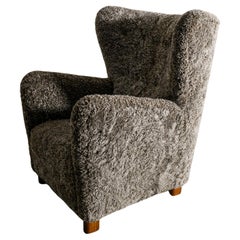 Vintage Danish Mid Century Wingback Armchair with Sheepskin Produced in Denmark, 1940s 